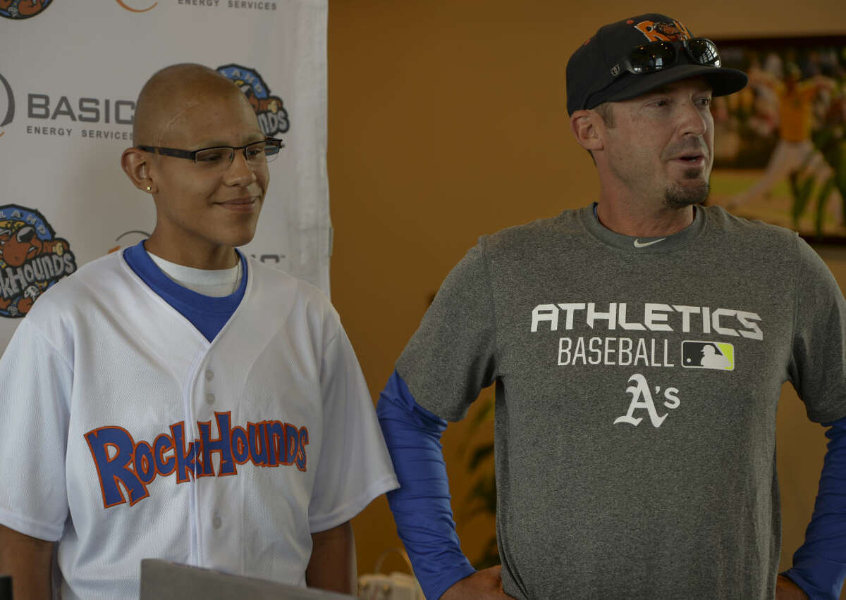 Marcelino Rodriguez, 15, is the newest player for the RockHounds Friday 7-3-15, as manager Ryan Christenson announces him as an official team member as part of his Make-A-Wish. Tim Fischer\Reporter-Telegram