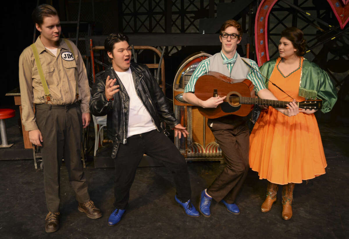 Dylan Watson as Jim listens as Jack Smith, Chad sings and Jamie Edge as Dennis, plays guitar and Kyle McDuffey as Sylvia listens during MCT's production of All Shook Up. Wednesday 7-1-15, Tim Fischer\Reporter-Telegram