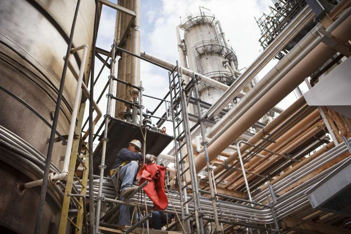 A worker at Valero Energy's refinery in Three Rivers, Texas, Oct. 12, 2012. Refining, once regarded as a low-margin, accident-prone part of the energy industry, is doing better in part because of cheaper natural gas and domestic crude oil. (Michael Stravato/The New York Times)