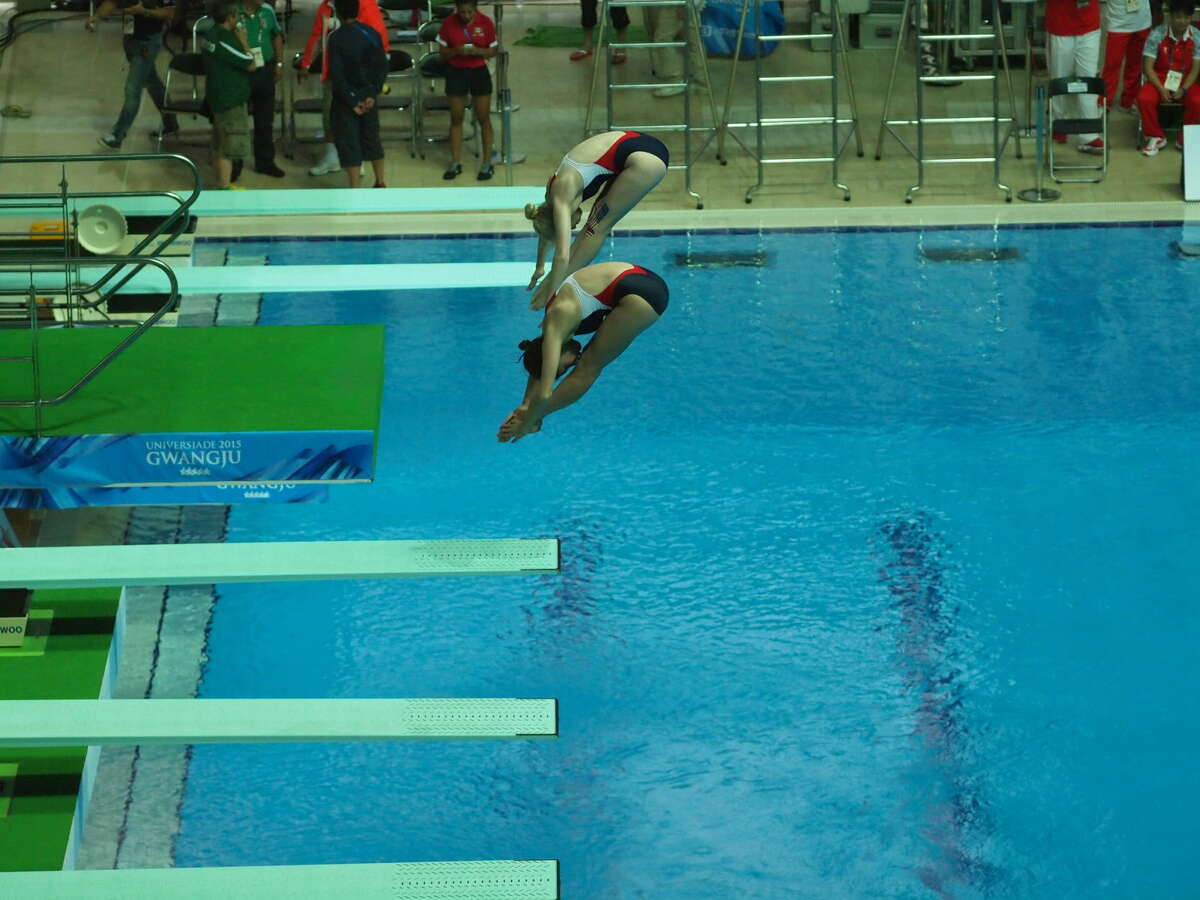 Midland Christian grad and former City of Midland diver Haley Allen (top) is shown here diving with partner Olivia Rosendahl in the 3-meter synchronized diving event during the World University Games held in Gwangju City, South Korea, earlier this month. Courtesy Photo