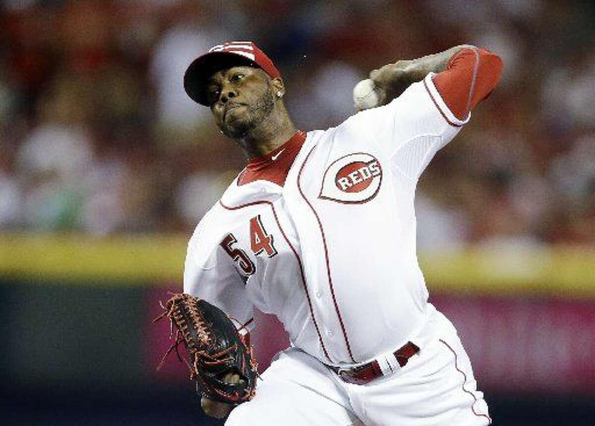National League's Aroldis Chapman, of the Cincinnati Reds, throws during the ninth inning of the MLB All-Star baseball game, Tuesday, July 14, 2015, in Cincinnati.