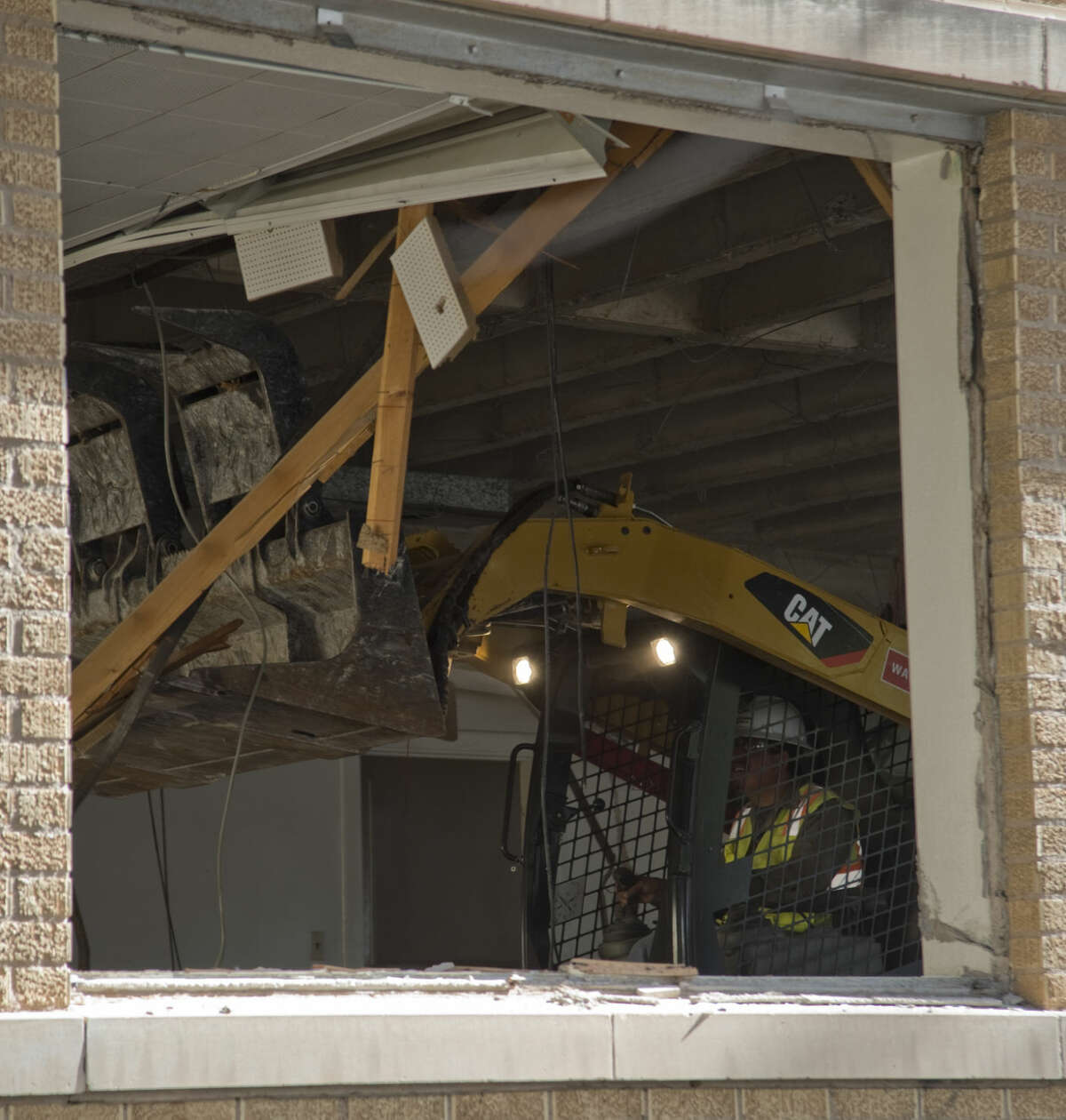 Demolition of the Mid-America Building can be seen Tuesday 8-11-15. Tim Fischer\Reporter-Telegram
