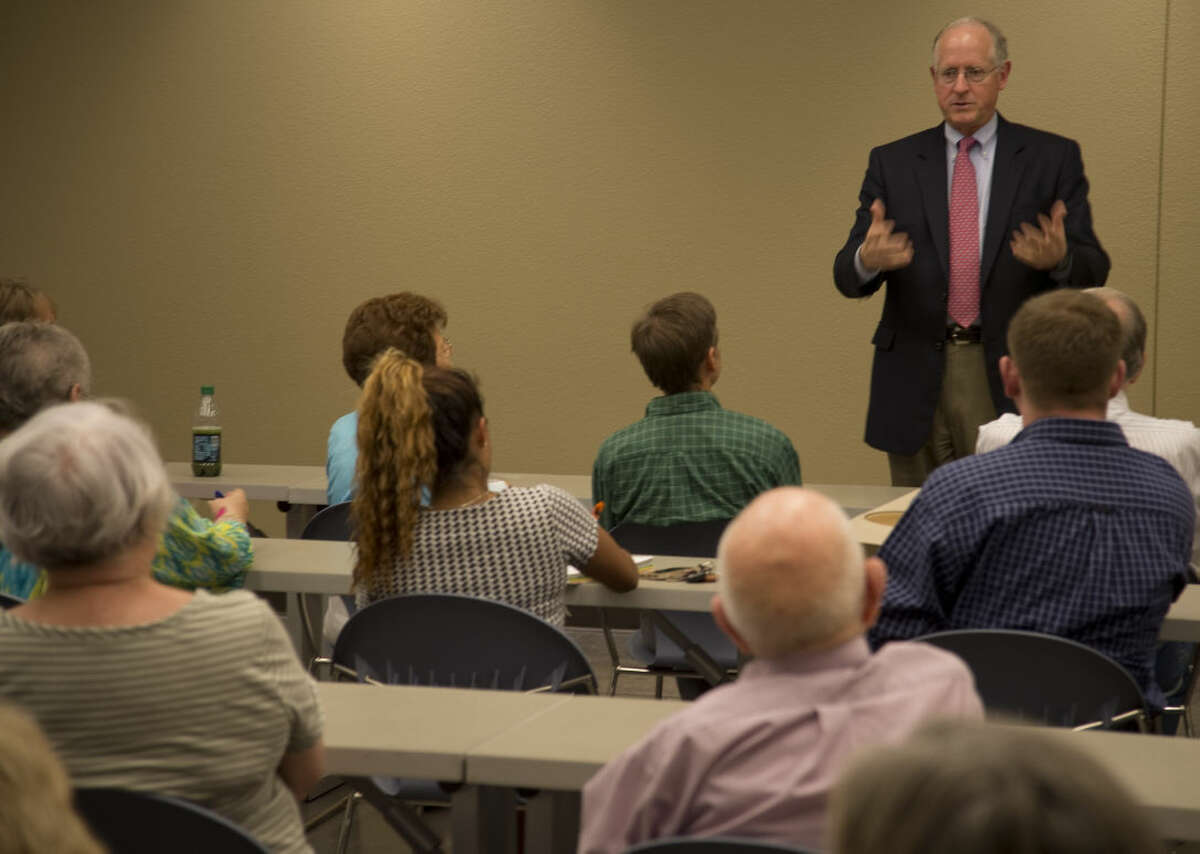 U.S. Representative Mike Conaway addresses a full room Monday 8-31-2015 during a town hall meeting at the Midland Centennial Library. Tim Fischer\Reporter-Telegram