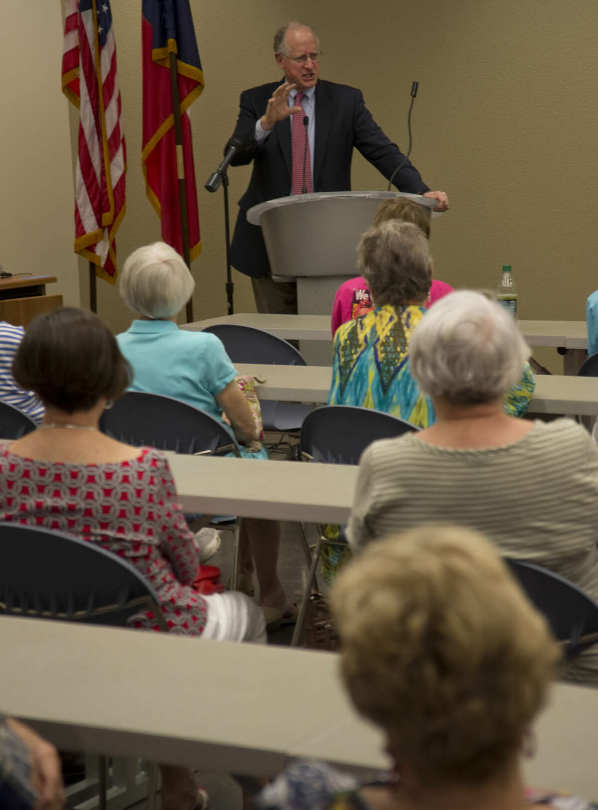 U.S. Representative Mike Conaway addresses a full room Monday 8-31-2015 during a town hall meeting at the Midland Centennial Library. Tim Fischer\Reporter-Telegram