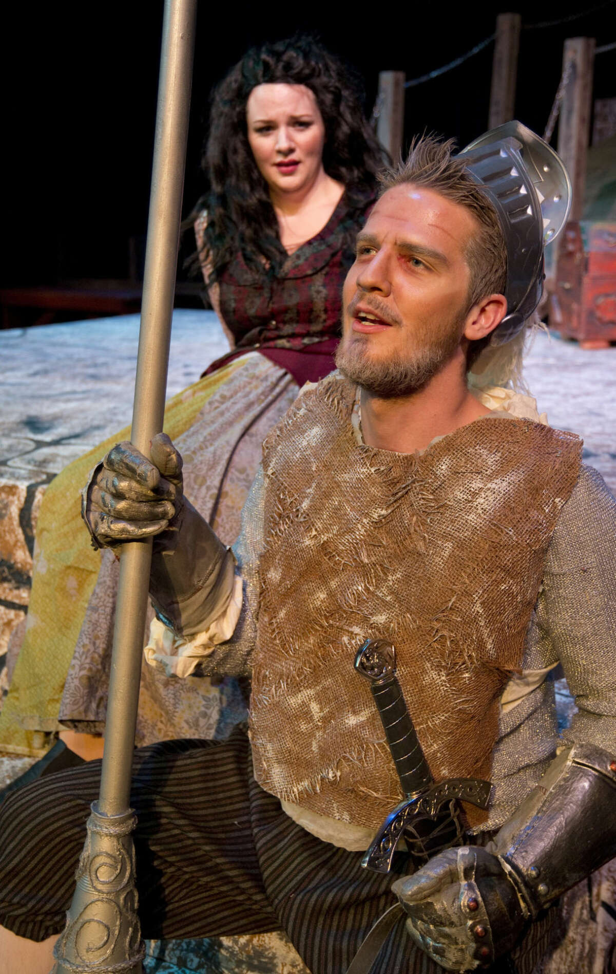 Abby Anderson as Aldonza looks at Drew Henry as Don Quixote in 'Man of La Mancha.'