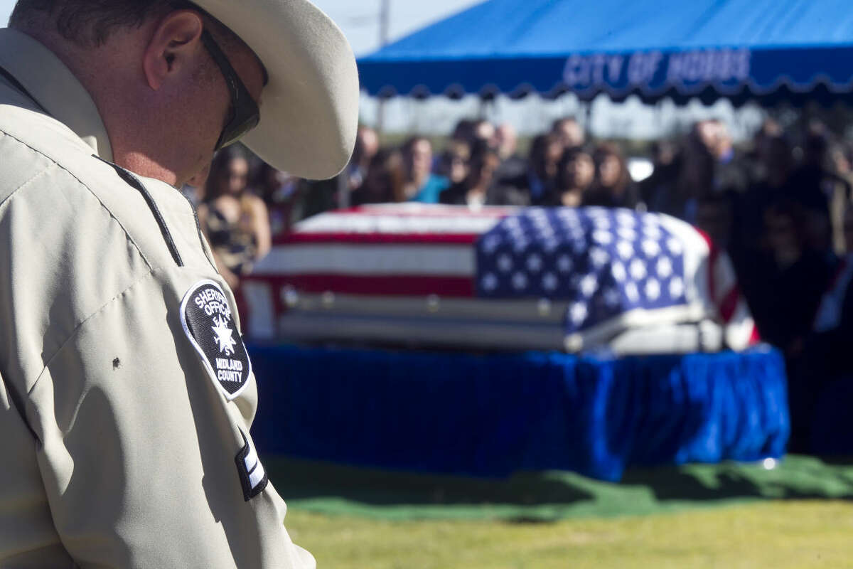 Burial ceremony for Midland County Sheriff's Dept. Sgt. Mike Naylor at Prairie Haven Cemetery in Hobbs, New Mexico, last year. James Durbin/Reporter-Telegram