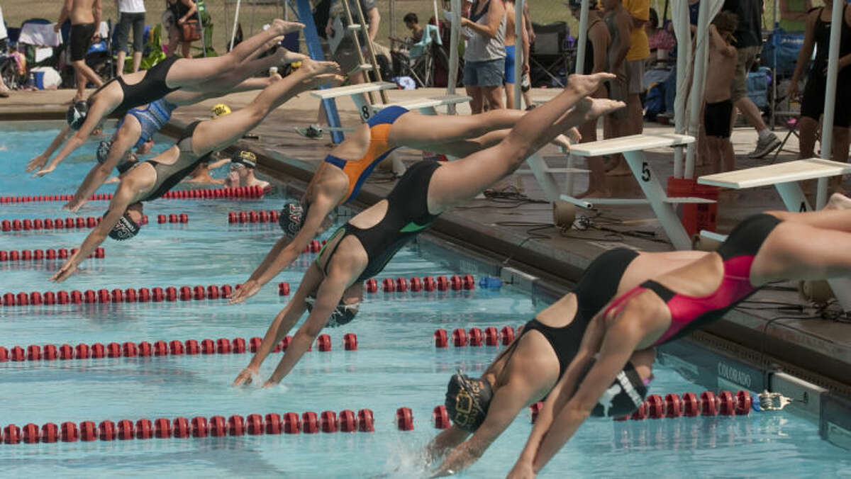 (File Photo) Swimmers take the start for the 50m freestyle Friday at the Frost Bank Invite at Doug Russell Pool. Tim Fischer\Reporter-Telegram