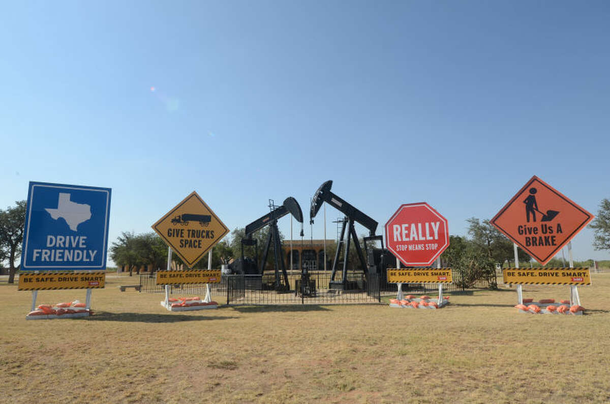 The Texas Department of Transportation displayed traffic safety signs in front of the Petroleum Museum on Saturday. James Durbin/Reporter-Telegram