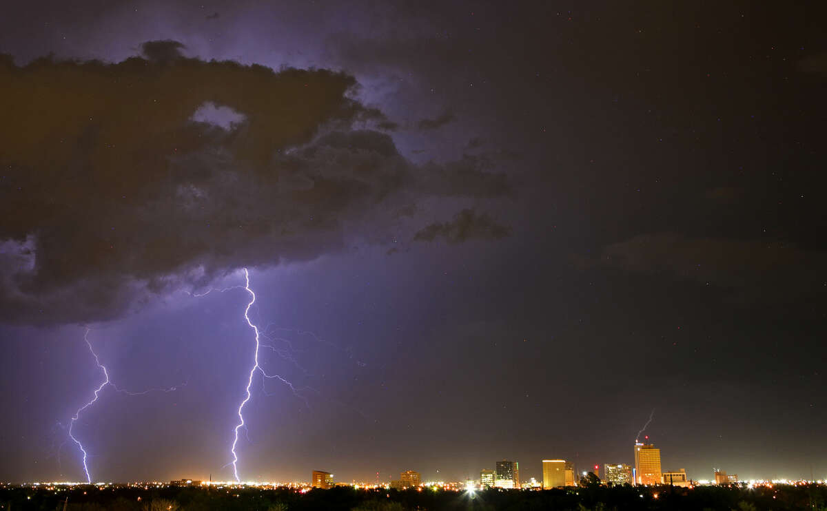 Lightning strikes east of downtown Midland after thunderstorms swept across the area in a Reporter-Telegram file photo.