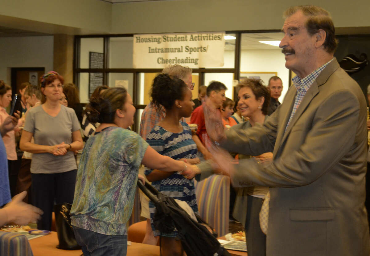 Marta and Vicente Fox, former President of Mexico, greet students and faculty during a Diez y Seis celebration at Midland College Scharbauer Student Center Tuesday afternoon. Tim Fischer\Reporter-Telegram