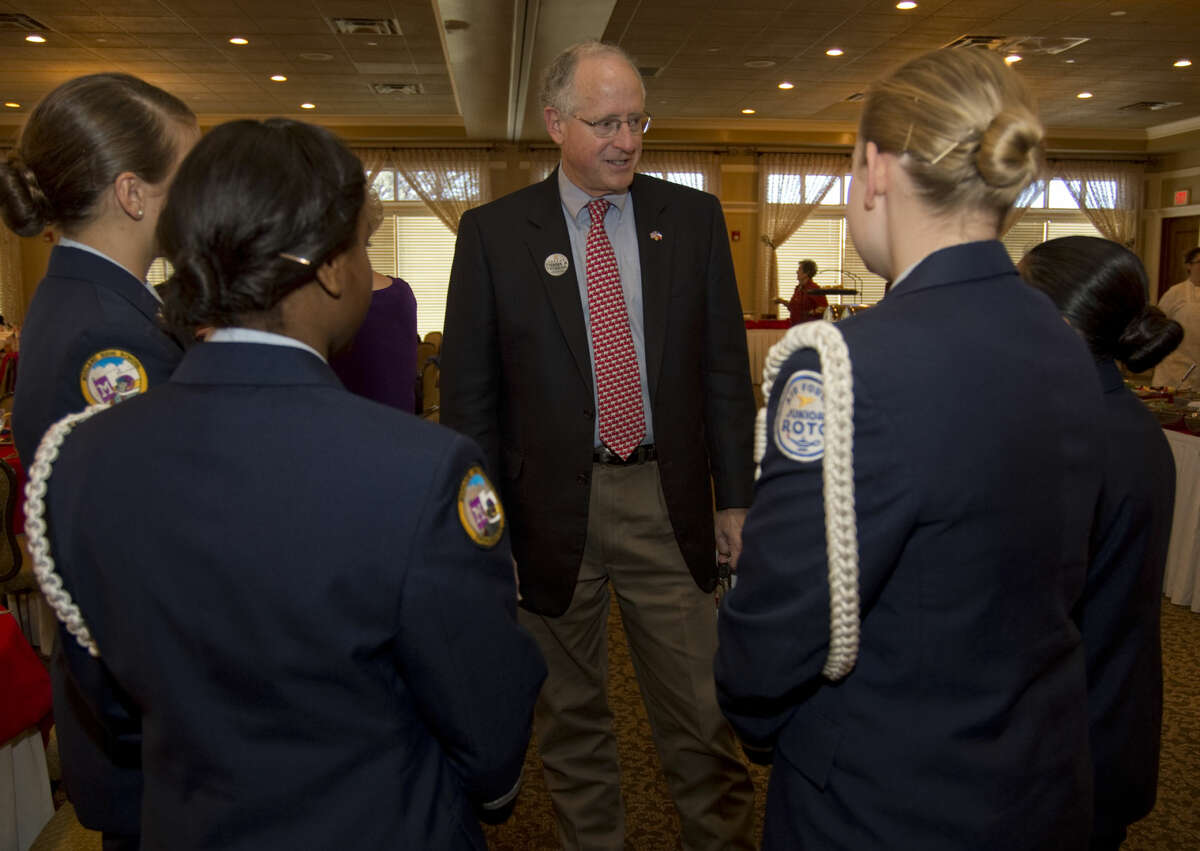 U.S. Rep. Mike Conaway talks with Midland High JrROTC Honor Guard members, Cadet Sr. Airman Maria Hall, Cadet Airman 1st Class Nikayla Johnson, Cadet 1st Lt. Natalie Jarratt and Cadet Major Cinthia Aguiler Wednesday 11-11-2015 before the Midland County Republican Women's luncheon at Midland Country Club. Tim Fischer\Reporter-Telegram