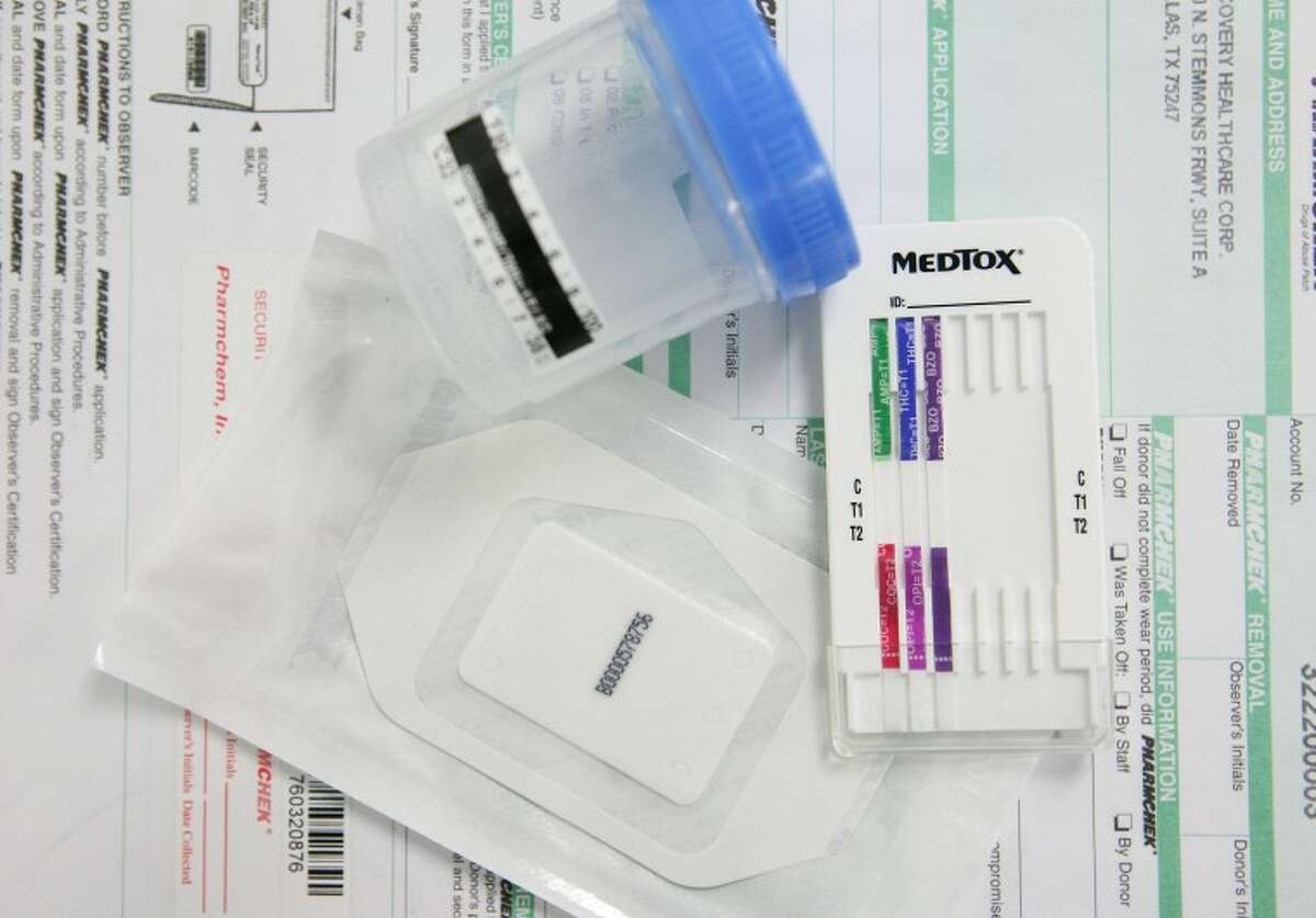 Drug patches and Urine Analysis Dip Test are among the tools that adult probation officers at the Midland Judicial District's Community Supervision and Corrections Department are using to test if probationers are taking drugs. Photo Illustration by Cindeka Nealy/Reporter-Telegram