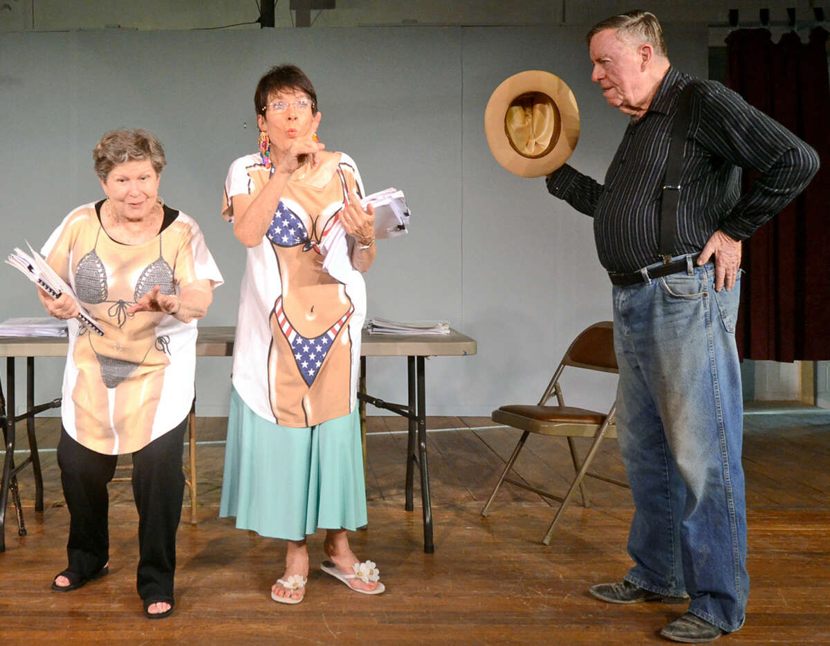 From left, Charlyne Dodge ("Lilly"), Marion Kimberly ("Milly") and Harry Harrison ("Big Earl") rehearse a scene for the Maverick Players performance of "Real Close To Broadway" at the VFW Hall on Veterans Airpark Road.