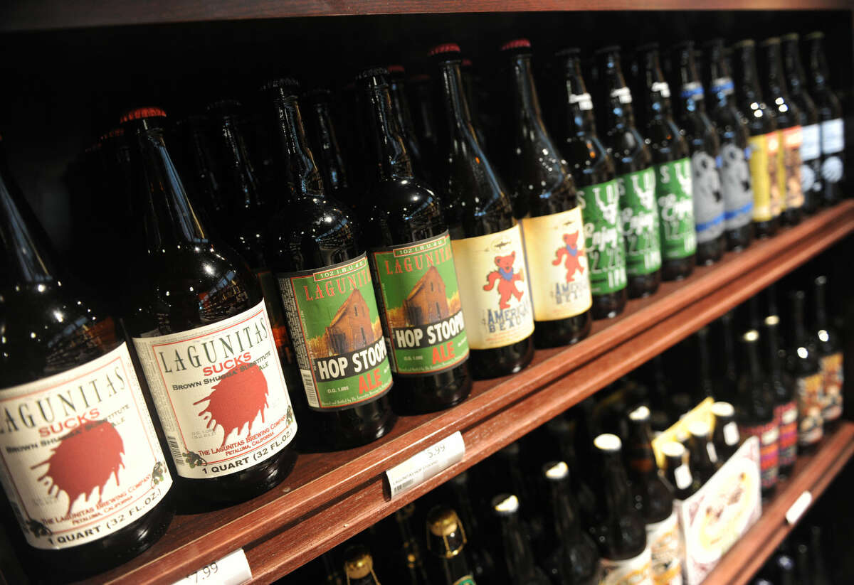 A variety of unique craft beers are available in the new wine and spirits addition of Balducci's Food Lover's Market in Greenwich, Conn. Friday, Dec. 5, 2014. The gourmet grocery store just completed renovations and expansions, including a new mezze and olive bar, more executive chef-prepared foods, larger selection of local and international cheeses, improved selection of fine-cut meats and a brand new wine and liquor store attached to the market. The wine and liquor store carries an immense variety of wines, including Balducci's brand, along with many hand-to-find craft beers and, of course, a selection of liquor.