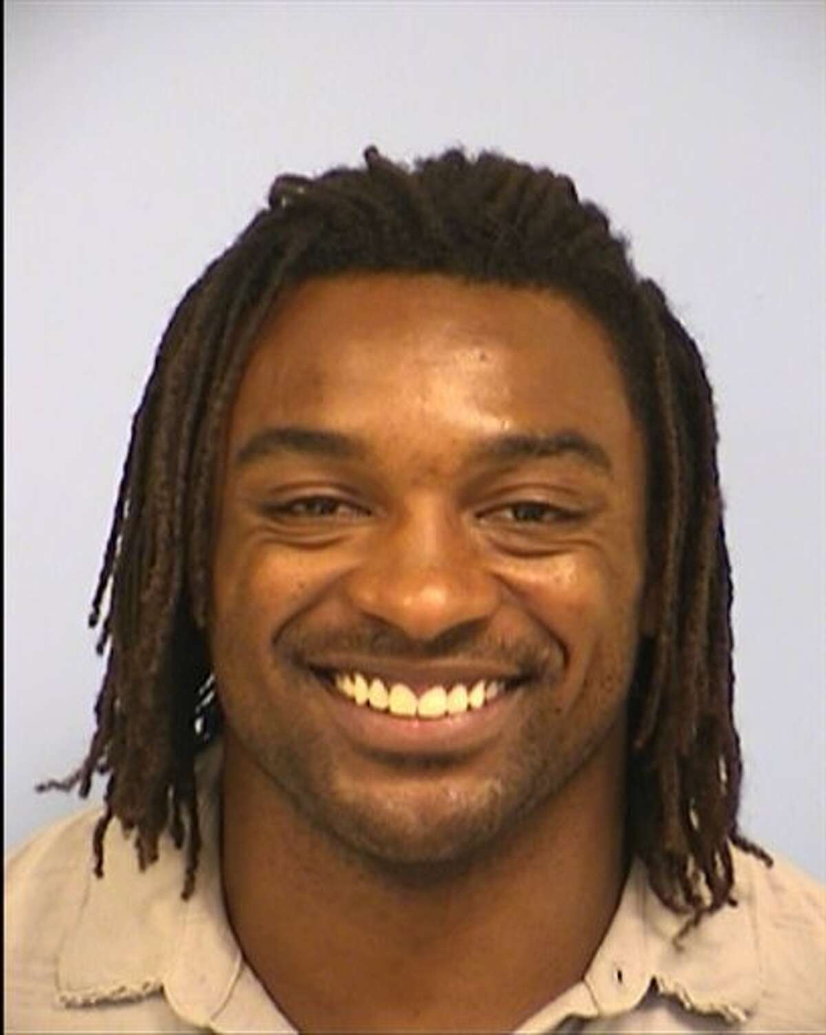 This undated mug shot provided by the Austin Police Department shows a booking photo of Cincinnati Bengals running back Cedric Benson. Benson was released from jail on Sunday, July 17, 2011, following an arrest on an assault charge, the second year in a row he has gotten into trouble in his home state. (AP Photo/Austin Police Department)
