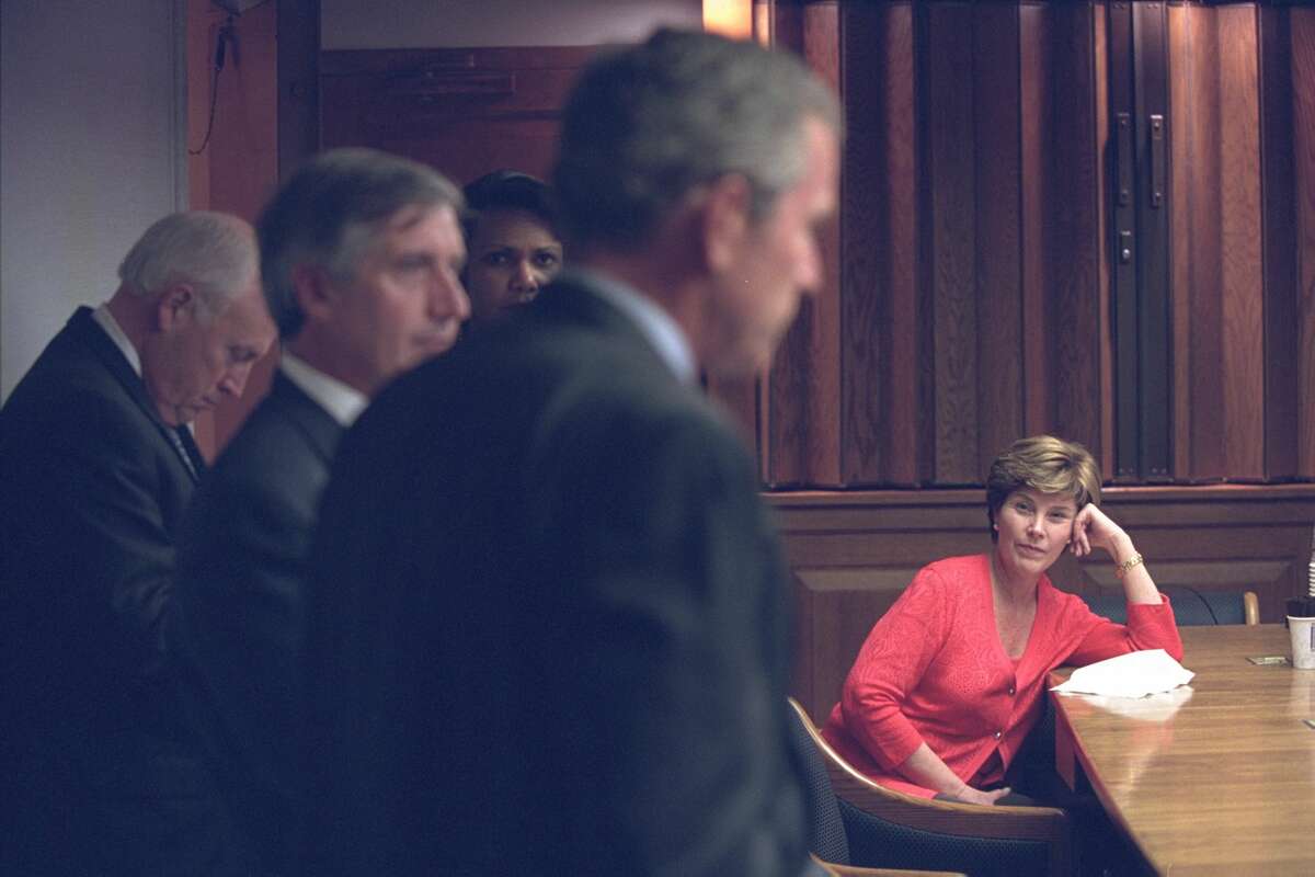 President Bush arrived at the White House Presidential Emergency Operations Center around 7 p.m. Here he is shown with his wife, First Lady Laura Bush, Vice President Cheney and National Security Adviser Condoleezza Rice. Via PBS.