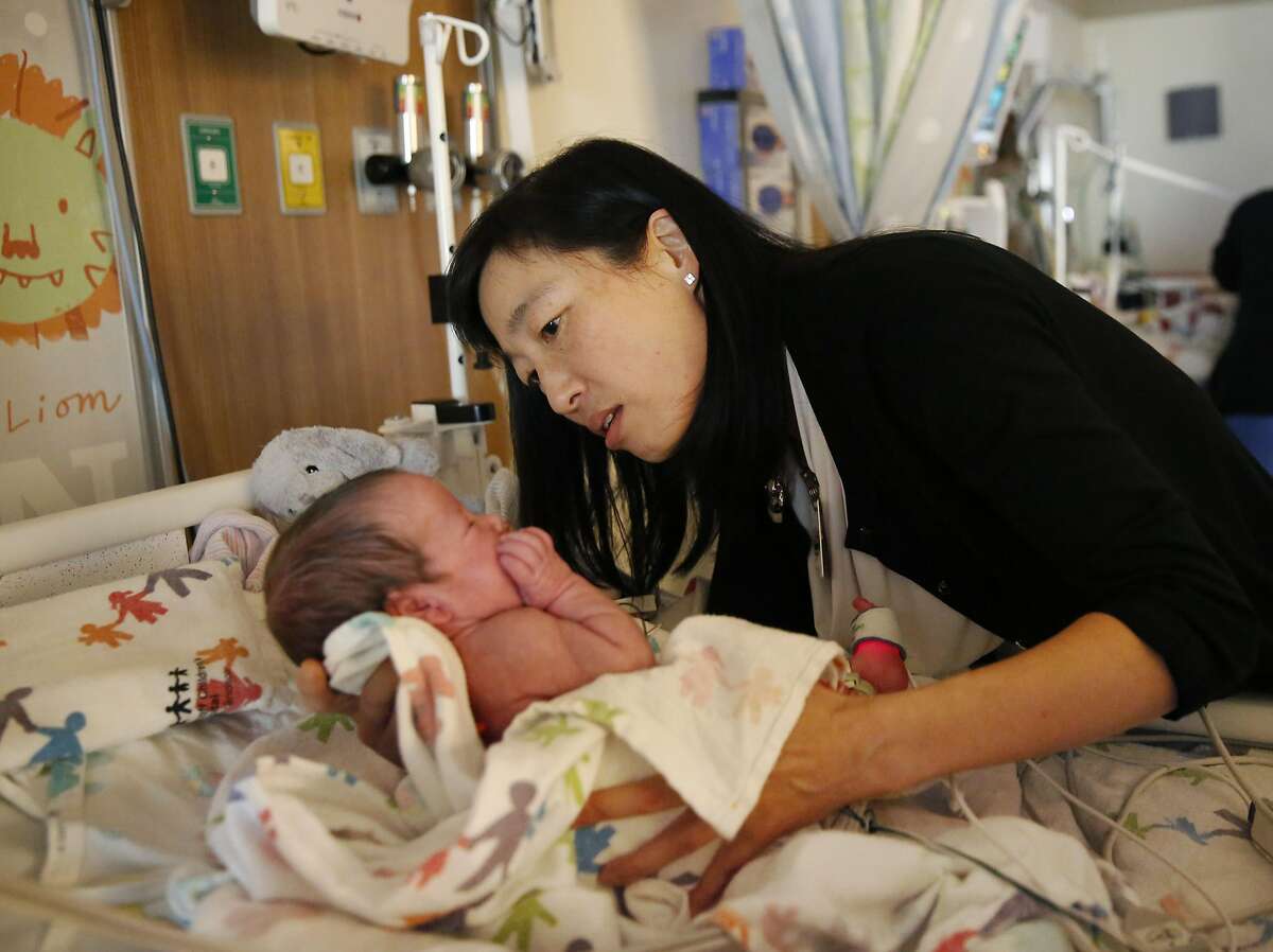 Dr. Yvonne Wu does a routine examination on a premature baby who does not suffer from HIE and who is neurologically normal while doing her regular rounds at UCSF Medical Center at Mission Bay May 4, 2016 in San Francisco, Calif. Dr. Wu, a pediatric neurologist at UCSF Beinoff Children's Hospital, has led a study looking at the effectiveness of the drug erythropoietin or EPO on preventing newborn brain damage caused from Hypoxic-Ischemic Encephalopathy or HIE. HIE is a dysfunction of the nervous system brought on by mysterious birth complications that result in an inadequate flow of blood and oxygen to the brain and other organs, causing brain damage.