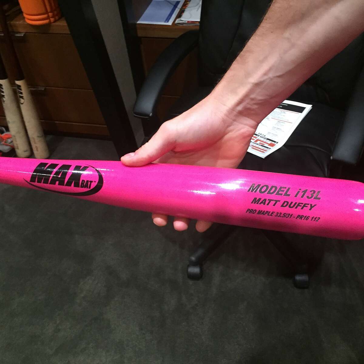 Matt Duffy of the San Francisco Giants displays his pink bat that he used against the Colorado Rockies on Mother's Day, May 8 2016, at AT& Park.