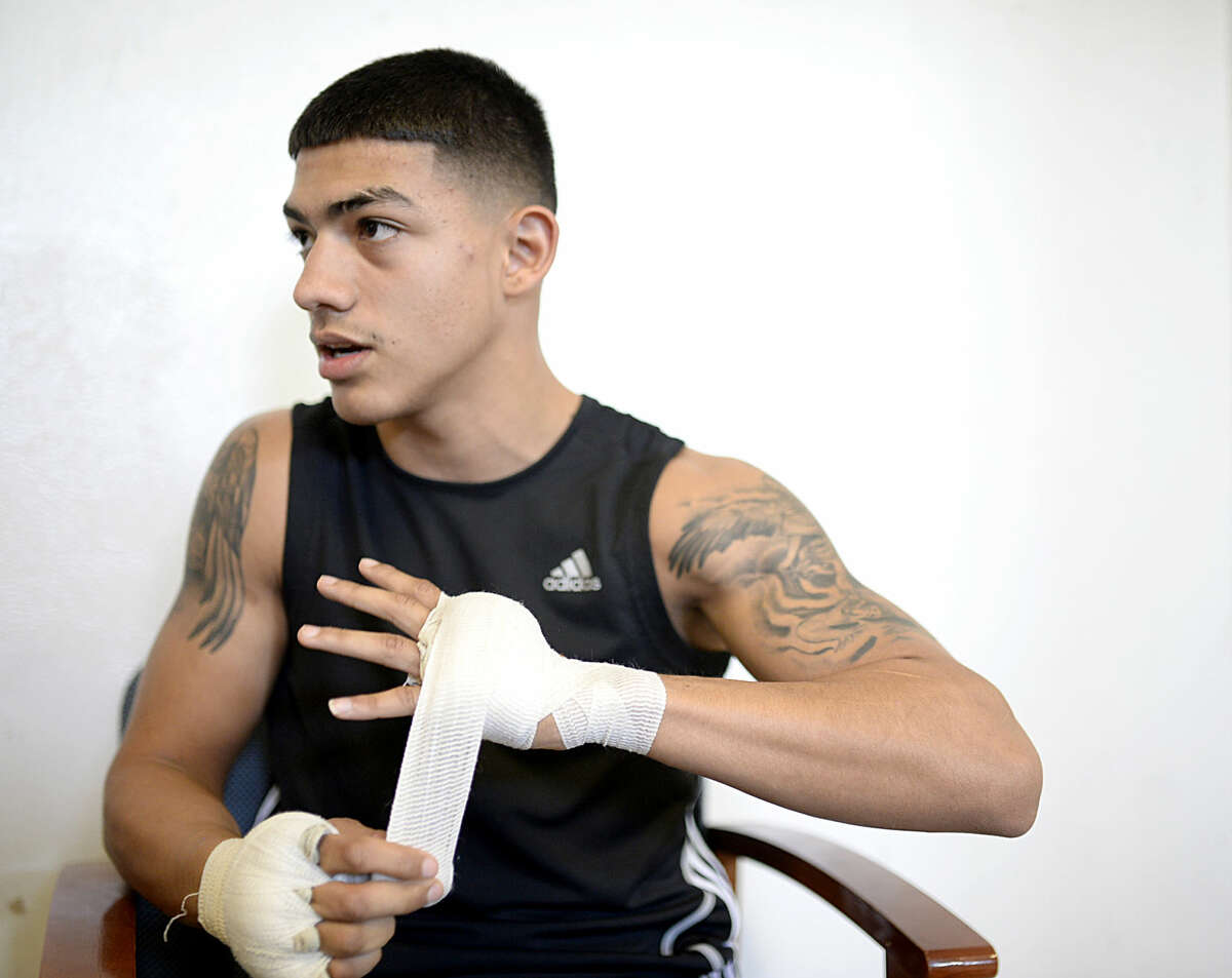 Michael Dutchover, a senior at Midland High, photographed while training Thursday, March 17, 2016, at the Clayton Williams Boxing Center. Dutchover won the Texas Golden Gloves boxing title in the 132-pound division. James Durbin/Reporter-Telegram