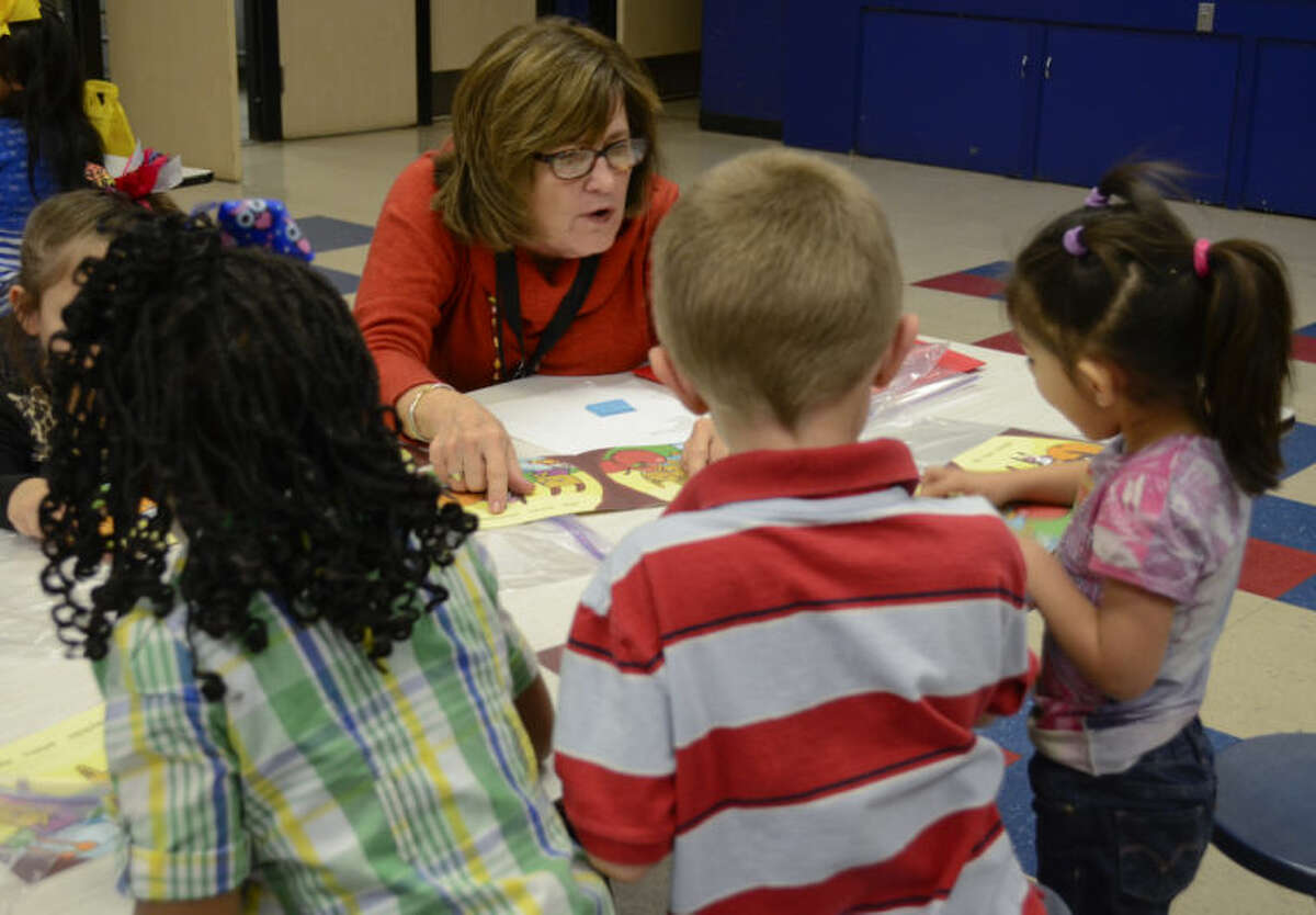 School board member Karen Nicholson was among volunteers with United Way and Women’s Leadership Council who read to students at Crockett Elementary during the 2013-14 school year as part of the Ready to Read program. Crockett is one of nine Midland ISD campuses on  Texas Education Agency’s “improvement required” list. Crockett is on for the sixth straight year.
