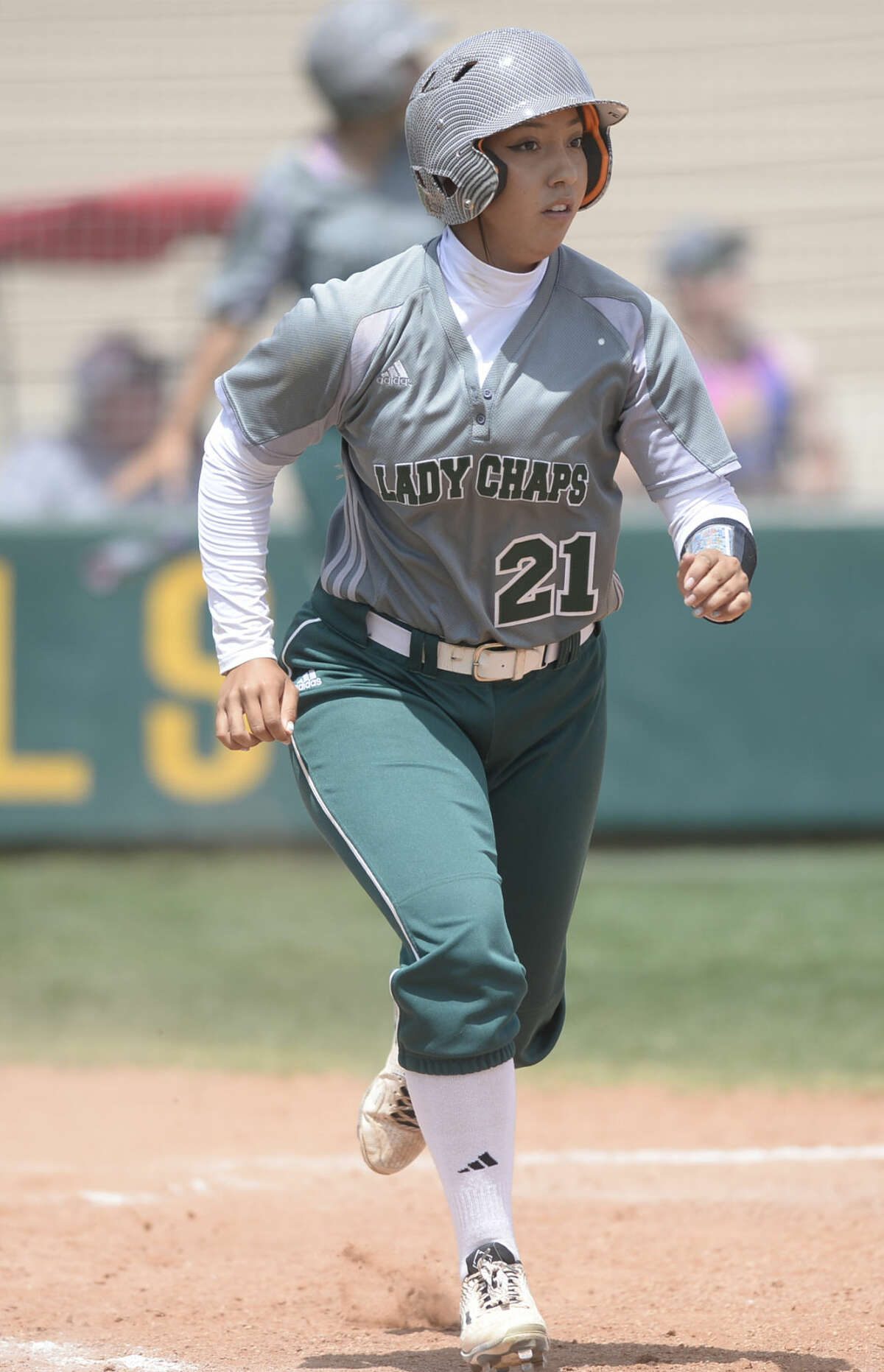 Midland College's Alexis Sullivan-Aguilar (21) runs to first base after hitting a home run against Clarendon on Saturday, April 16, 2016, at Midland College. James Durbin/Reporter-Telegram