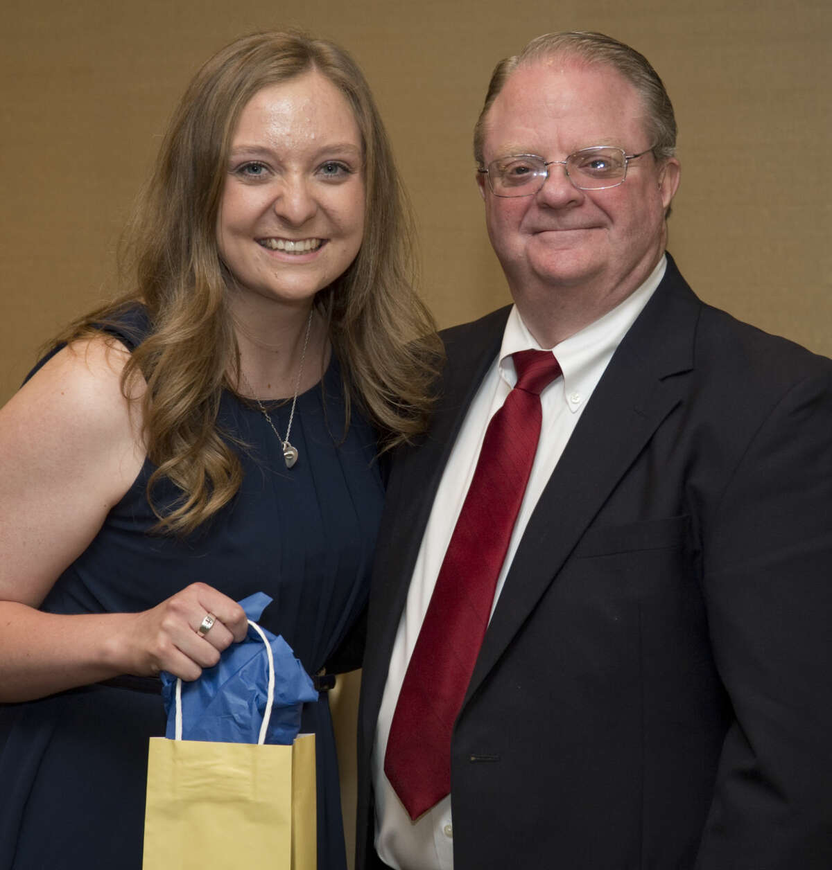 Lee High's Taylor Warren, honored by Eddie Wallace and The Exchange Club, Monday 04-25-16. Tim Fischer\Reporter-Telegram
