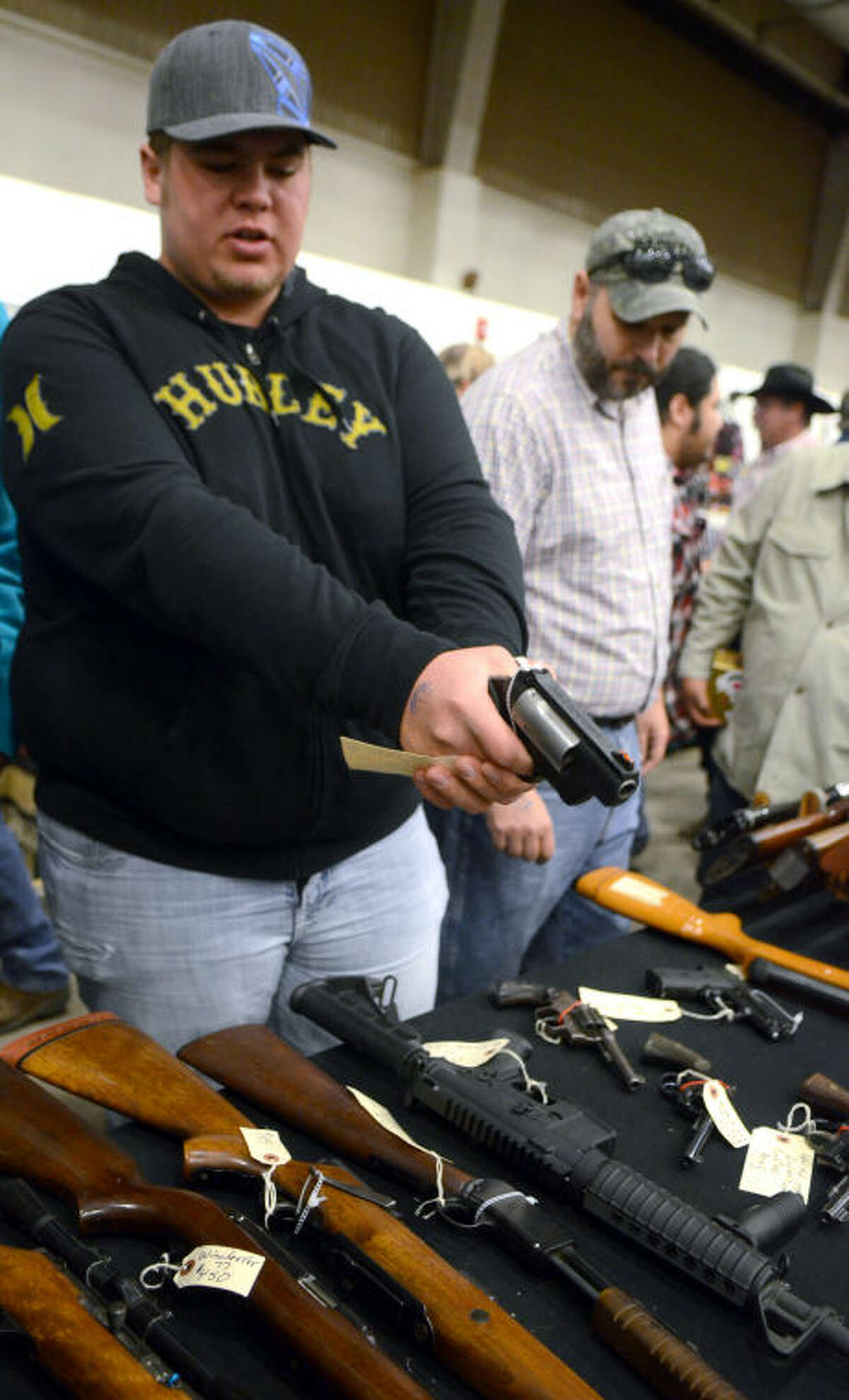 Gun show vendors, customers take issue with owner stereotypes