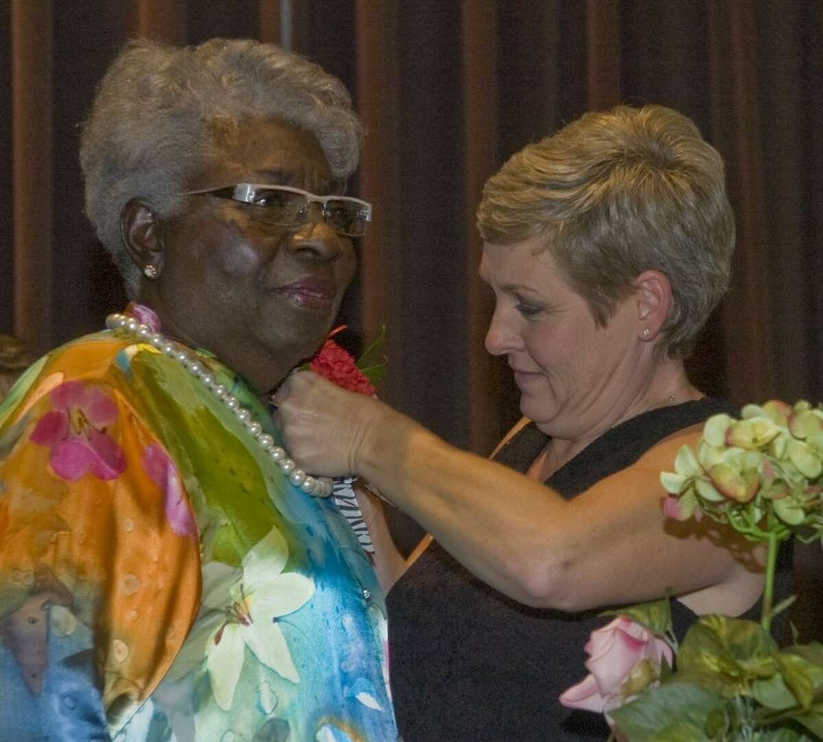 (File Photo) Barbara Yarbrough receives a corsage Saturday night as she is honored and roasted for her 51 years of service with MISD, as well as her 75th birthday.