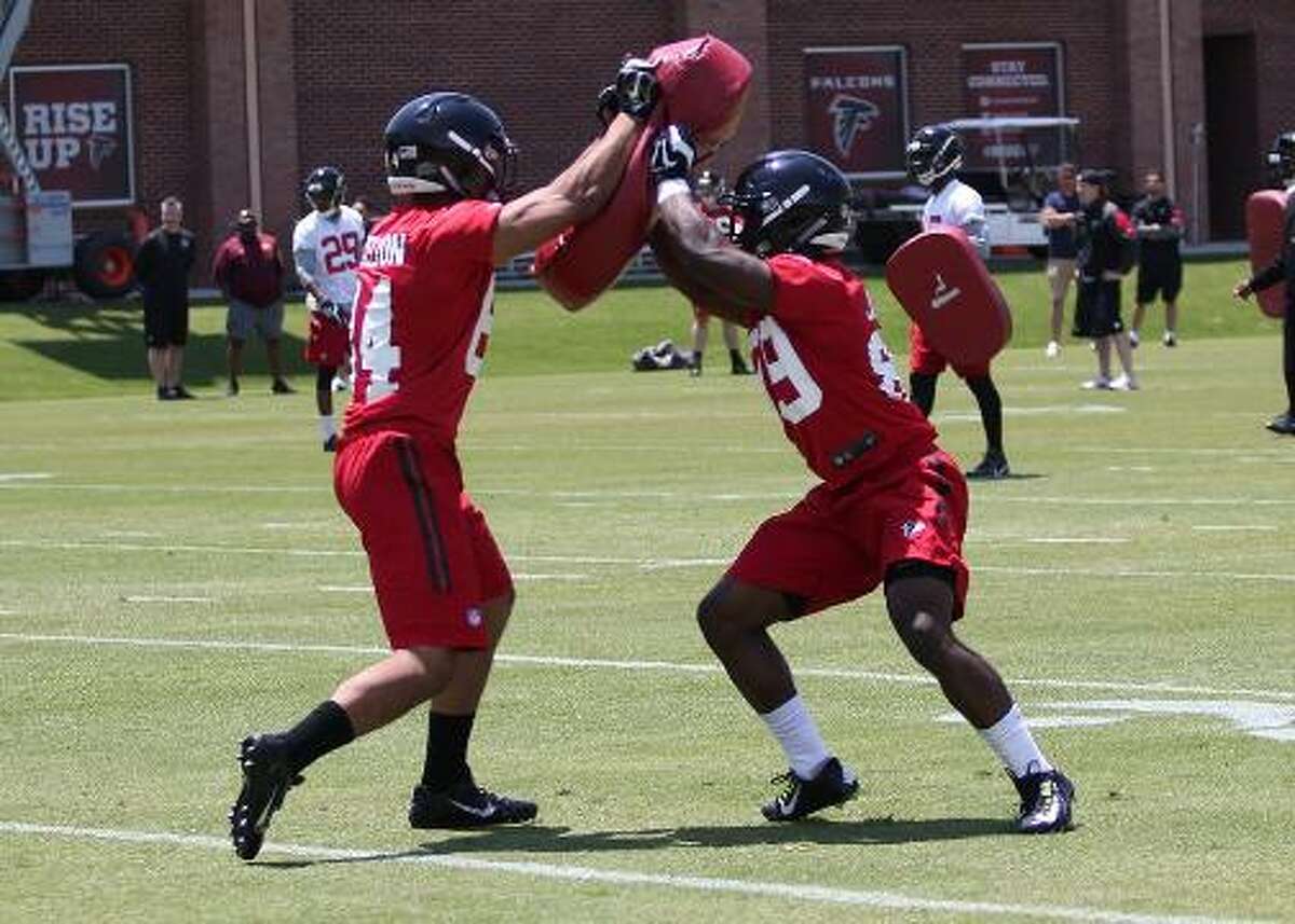 Former West Brook Bruin and Lamar Cardinal Reggie Begelton, left, runs a kickoff drill during the Atlanta Falcons' rookie camp last weekend in Atlanta. (Photo provided by Reggie Begelton)