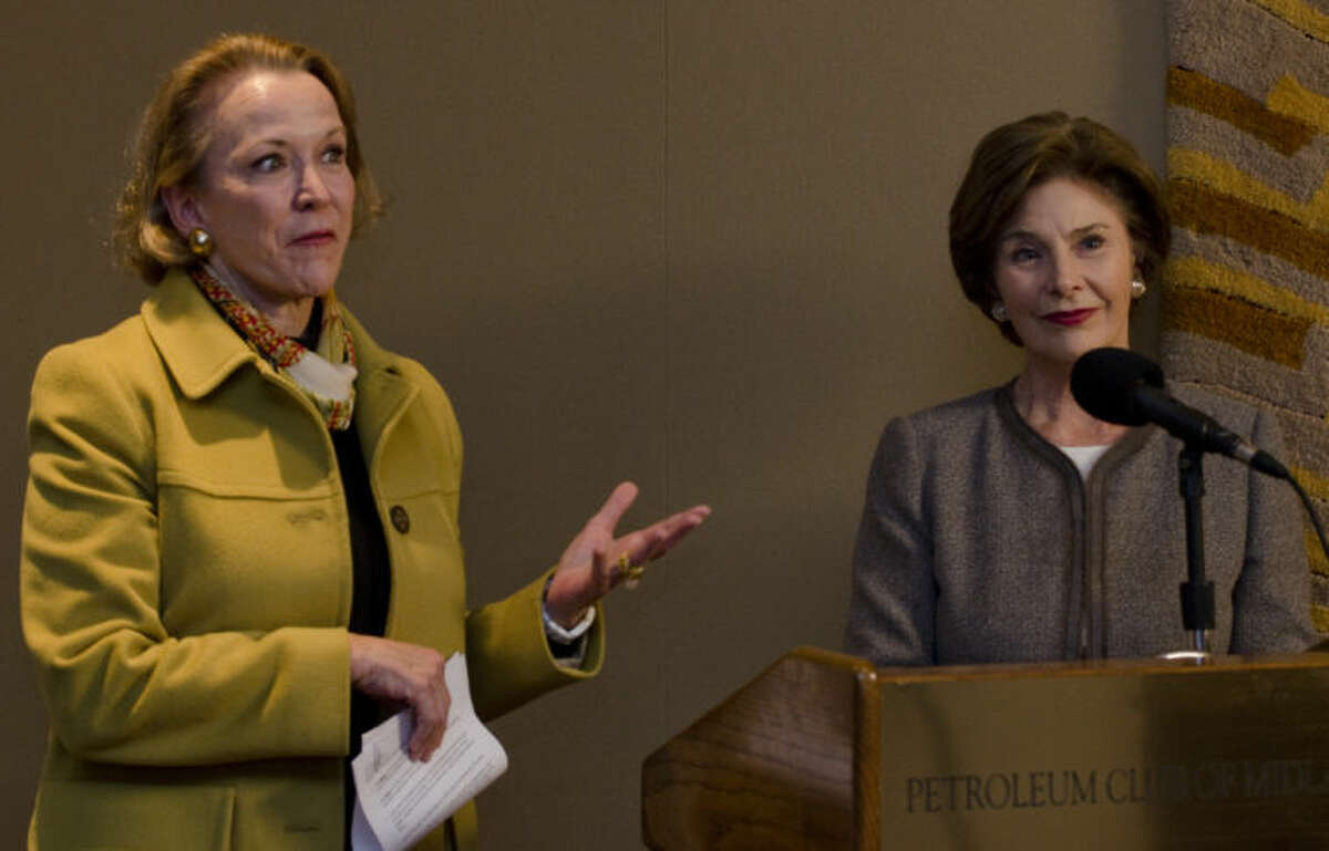 Katharine Armstrong, president of Taking Care of Texas, and Laura Bush, speak to the media at the Jenna Welch Nature Study Center symposium Friday morning at the Petroleum Club. Tim Fischer\Reporter-Telegram