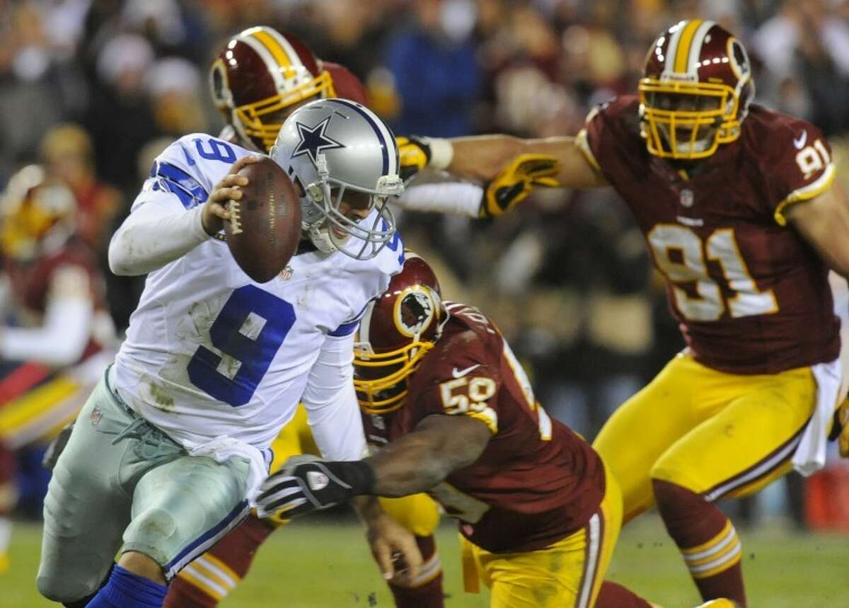 Romo's late INT sinks Cowboys against Redskins