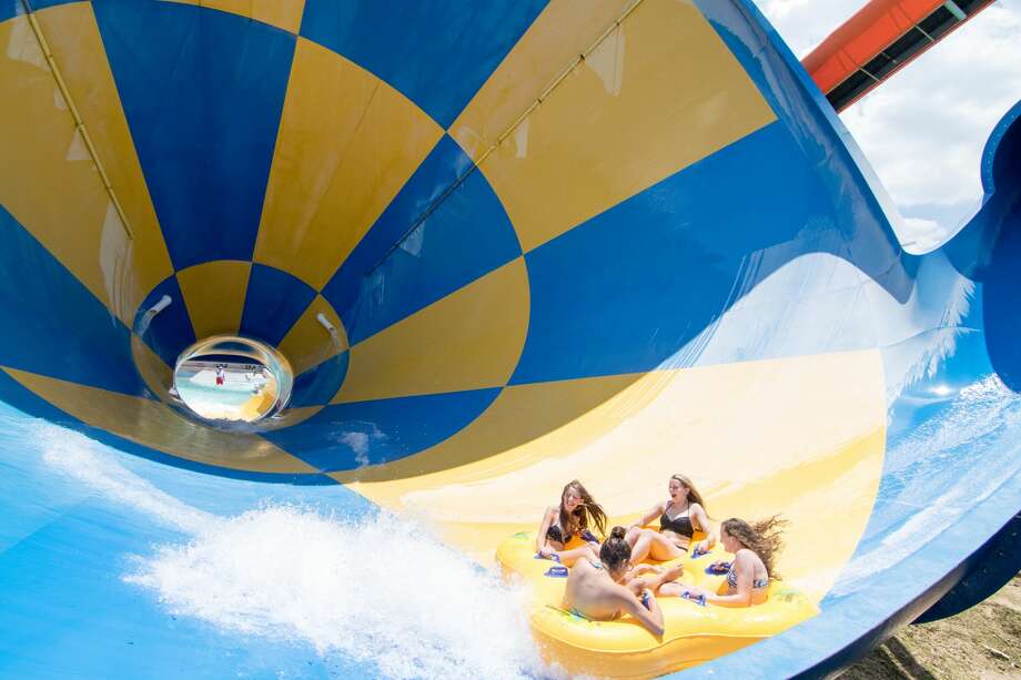 Spring's Wet'n'Wild SplashTown acquired by Six Flags along with a ...