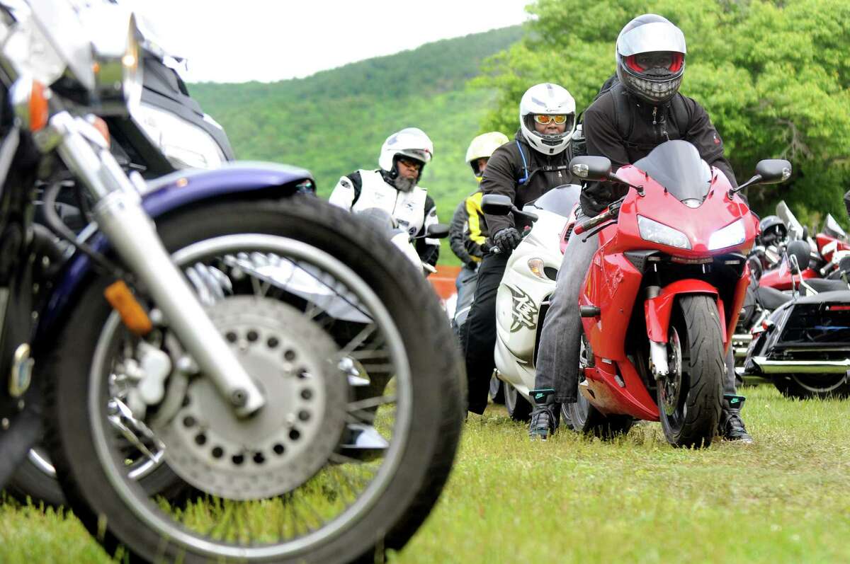 Motorcyclists pull in to park during Americade on Tuesday, June 2, 2015, in Lake George, N.Y. (Cindy Schultz / Times Union)