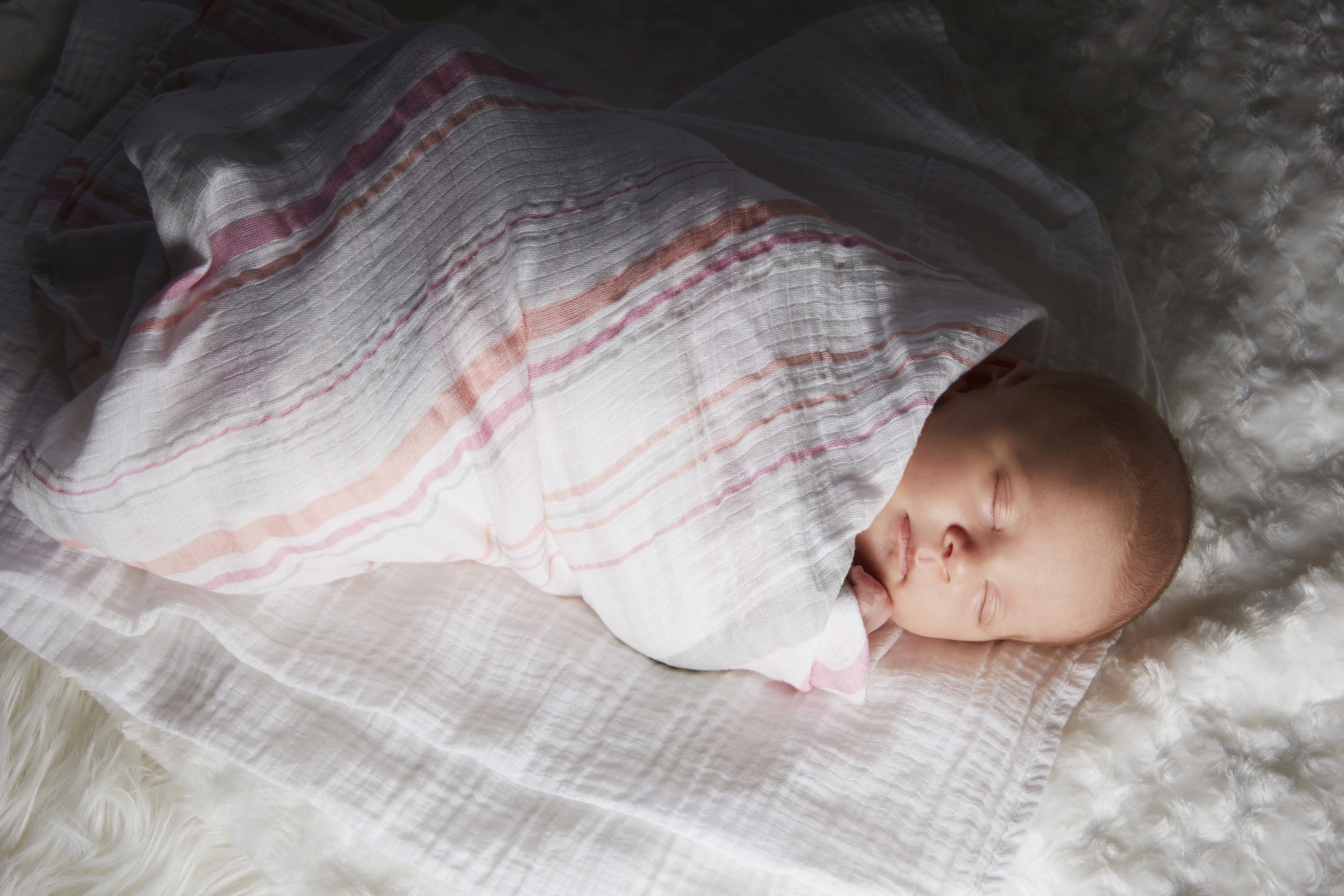 New research finds swaddling a baby may increase risk of SIDS
