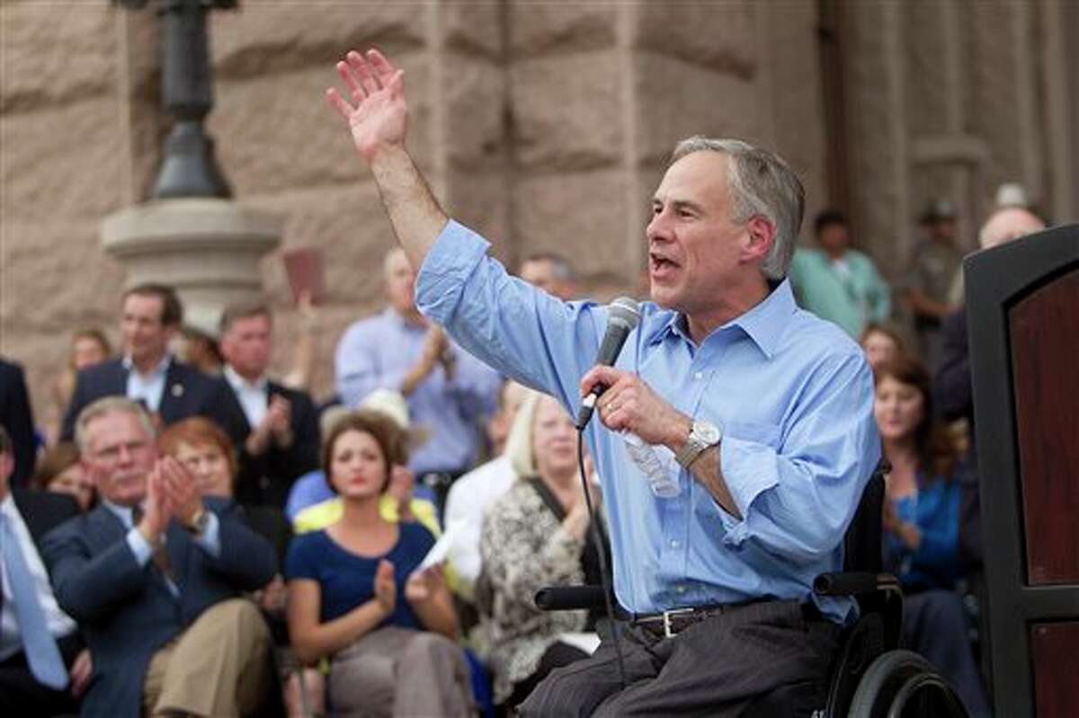 In this Monday, July 8, 2013, file photo Texas Attorney General Greg Abbott speaks to a anti-abortion rally, in Austin, Texas. Abbott appears to be in no hurry to declare his candidacy for governor, even after amassing a huge campaign war chest and a sense of inevitability among conservatives who are confident he'd cruise to election. (AP Photo/Austin American-Statesman, Alberto Martínez) AUSTIN CHRONICLE OUT, COMMUNITY IMPACT OUT, MAGS OUT; NO SALES; INTERNET AND TV MUST CREDIT PHOTOGRAPHER AND STATESMAN.COM
