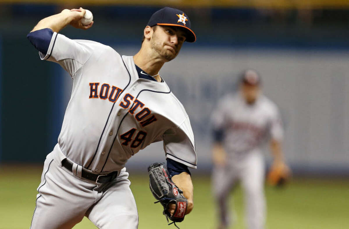 Houston Astros starting pitcher Jarred Cosart throws during the first inning of his major league debut against the Tampa Bay Rays on Friday in St. Petersburg, Fla. (AP Photo/Mike Carlson)
