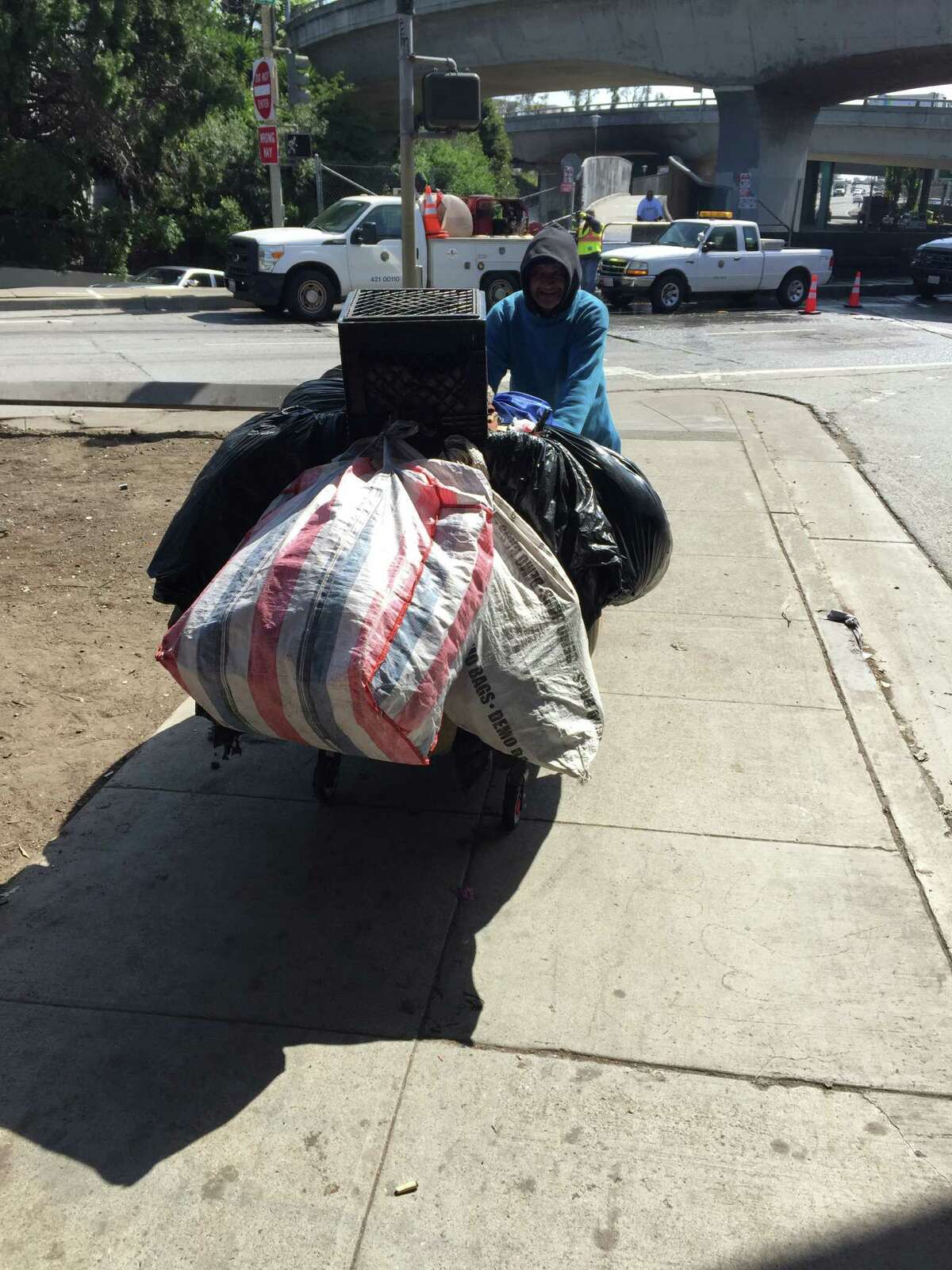One homeless camper got all of his belongings neatly bagged up and onto his shopping cart.