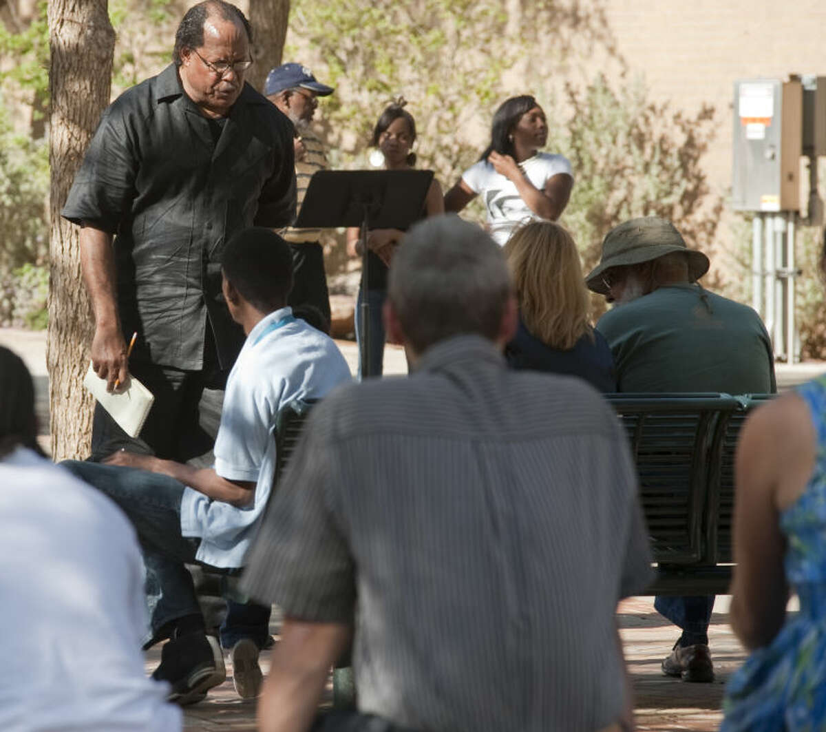 Gene Collins, NAACP local president, speaks to area residents Friday evening who came out to join in the Unity Rally at Centennial Plaza to show support and protest Stand Your Ground. Tim Fischer\Reporter-Telegram