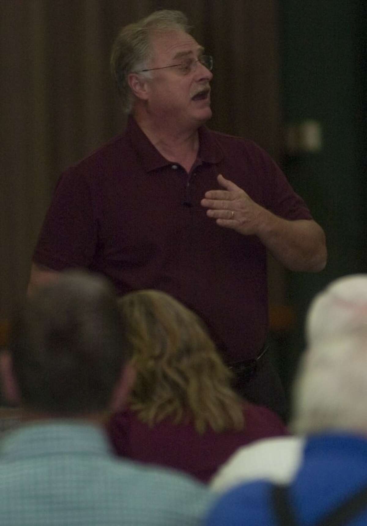 Jimmy Meeks, 30 years law enforecement retired and ordained minister, talks about why there is a need for safety in the church during a seminar Monday at the Midland Center. Photo by Tim Fischer/Midland Reporter-Telegram