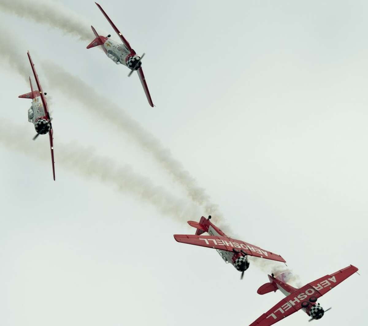 Aeroshell flight team perform maneuvers Friday during the Junior Aces AirSho performance at the CAF. Tim Fischer\Reporter-Telegram