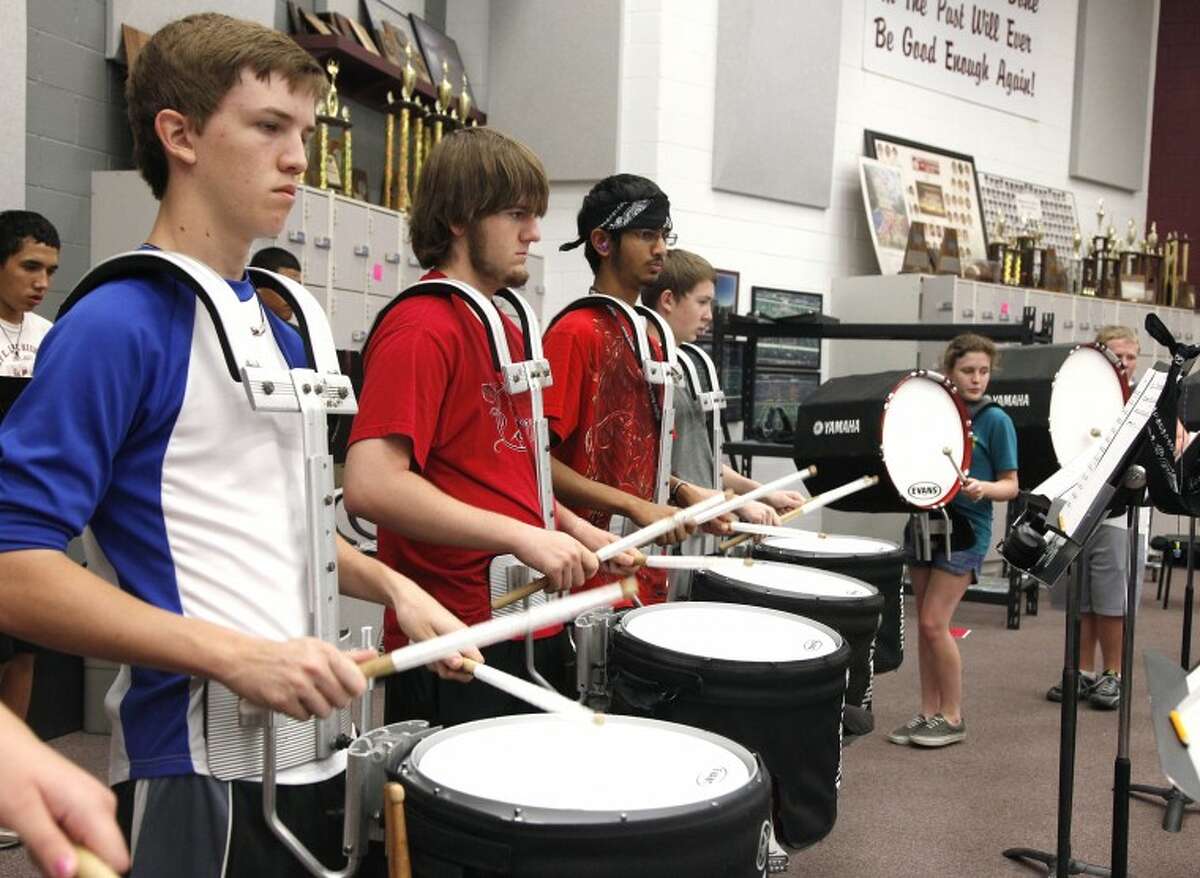 The Lee High School percussion section work together Tuesday afternoon to stay on the beat while learning the music of "Moorside March" for the coming semester. Chaney Mitchell/Reporter-Telegram