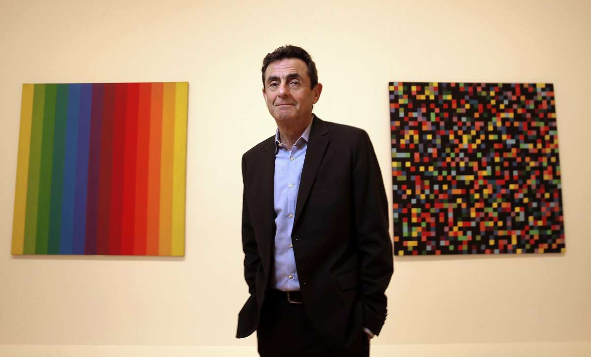 Director Neal Benezra in front of works by Ellsworth Kelly, Spectrum I, 1953, (left) and Spectrum Colors Arranged by Chance, 1951-53, at the new San Francisco Museum of Modern Art in San Francisco, California, on Thurs. May 5, 2016.