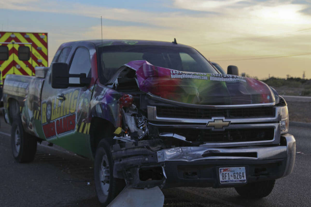The driver of this pickup was transorted with minor injuries to Midland Memorial Hospital after a crash caused by a passenger van crossing over oncoming traffic Thursday on Highway 191. Tyler White/Reporter-Telegram