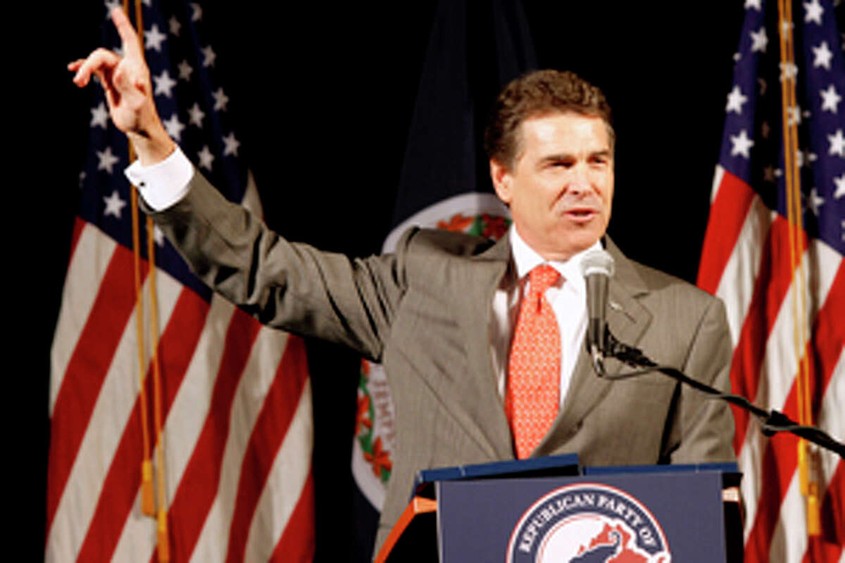 Republican Presidential candidate, Texas Gov. Rick Perry, gestures during a speech before a Virginia Republican fundraising event in Richmond, Va., Wednesday, Sept. 14, 2011. (AP Photo/Steve Helber)