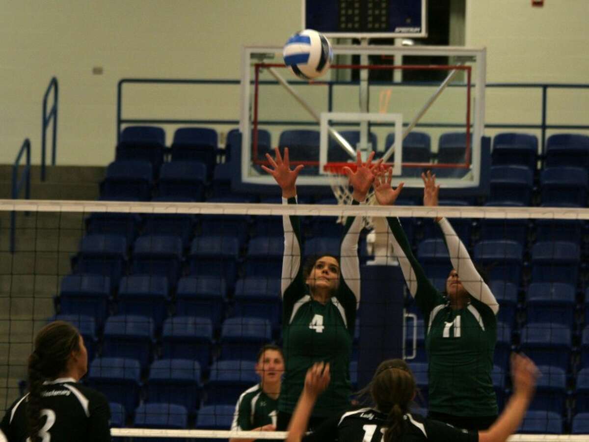 Midland College's Gaby Nieto (4) and Naomi Posada (11) go up for a block during Thursday afternoon's NJCAA Region V West Tournament final against Western Texas College at the Rip Griffin Center in Lubbock.Forrest Allen/Midland College Athletics