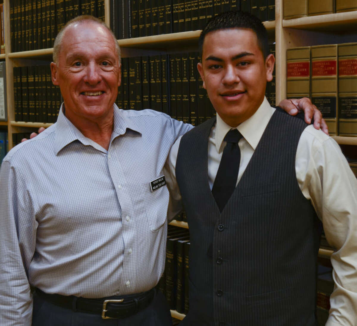 Patrick Whelan, board president for Teen Court, has mentored Luis Gomez since he came through the program in the seventh grade.. Tim Fischer\Reporter-Telegram