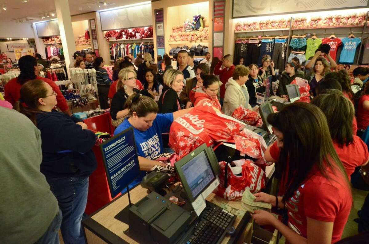 FILE -- Customers line up to pay for their items Friday morning at Aeropostale in Midland Park Mall.