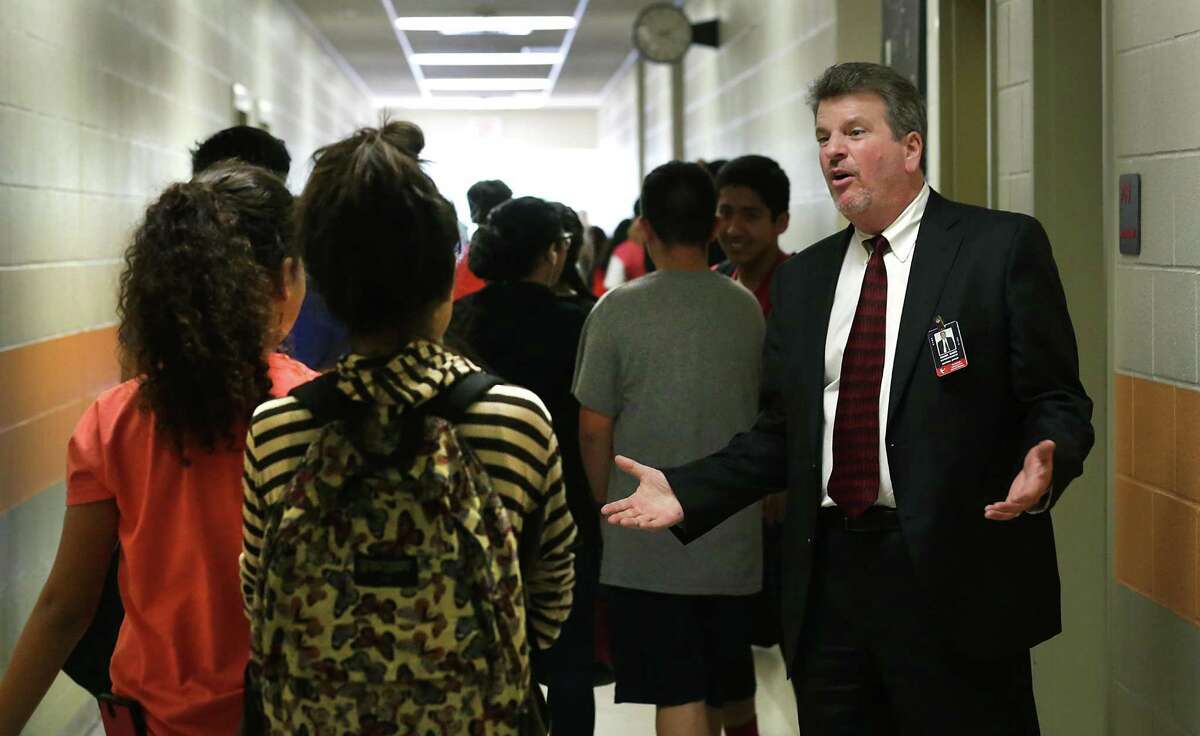 Superintendent Mark Eads greets students at Matthey Middle School, which could see improvements under a bond election.