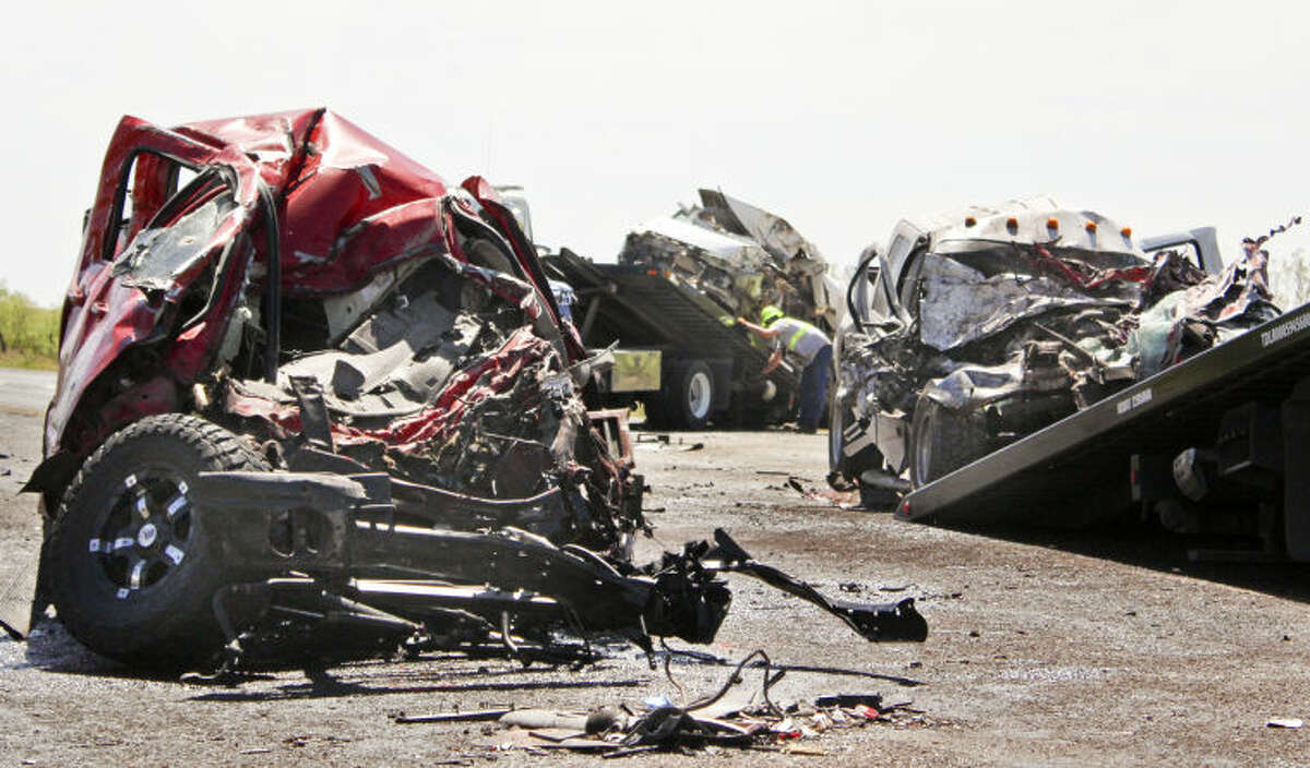 Three of the four vehicles involved Saturday morning's fatal crash that killed two men were destroyed on East Highway 158 near County Road 130. Tyler White/Reporter-Telegram