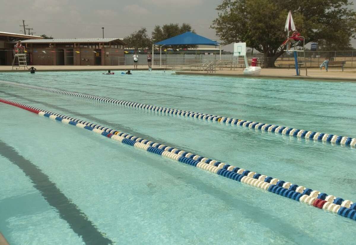 (File Photo) Doug Russell pool is nearly empty Saturday, even with Washington Pool closed because of lack of staff. Photo by Tim Fischer/Midland Reporter-Telegram